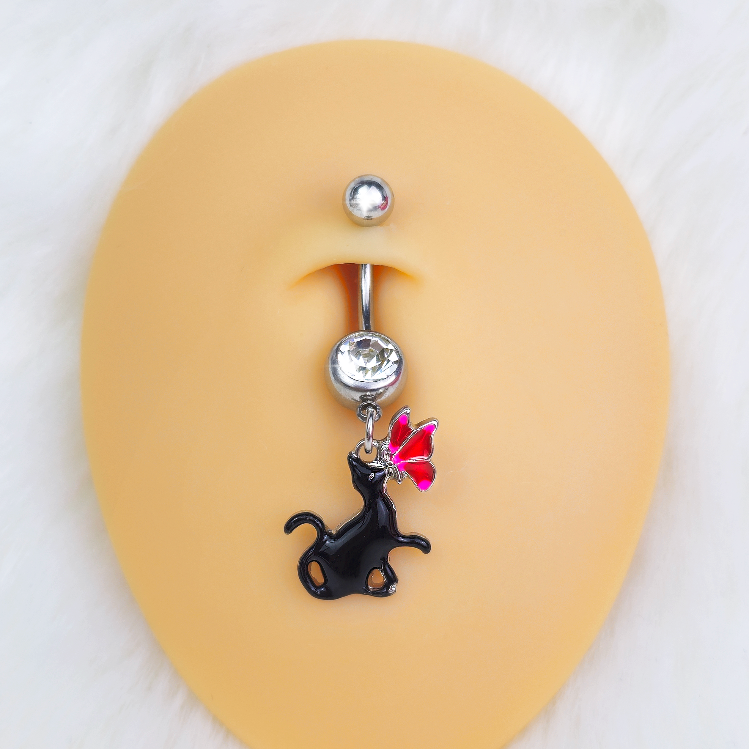 Clear gem butterfly and black cat dangle belly ring from BodyCandy, with a sleek, stylish design for pierced navel jewelry.