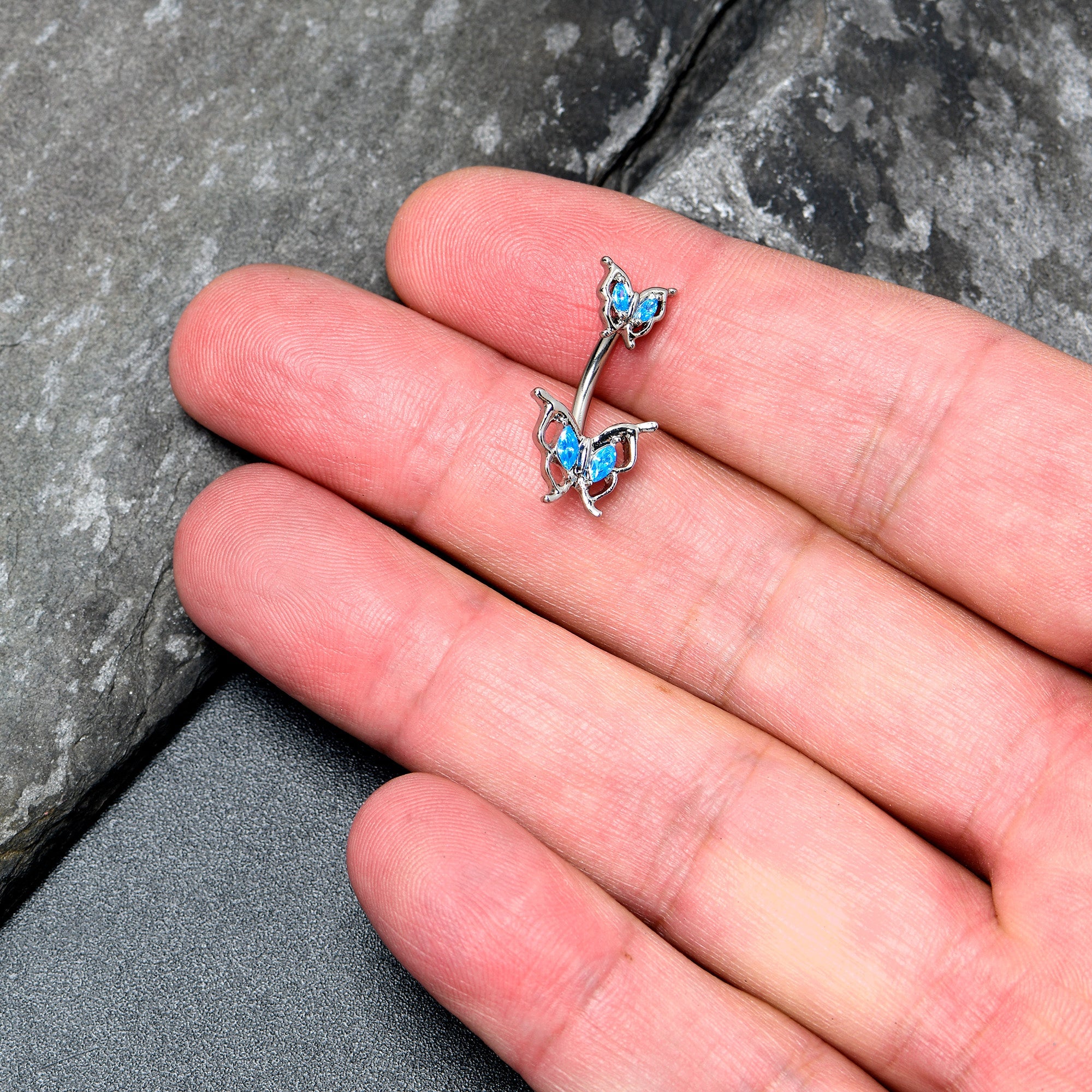 Blue gem butterfly double mount belly ring by BodyCandy featuring a fancy fab design and gemstone accents.