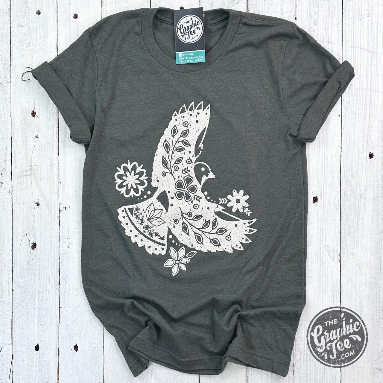 Military green short sleeve graphic tee featuring a boho bird design from The Graphic Tee.