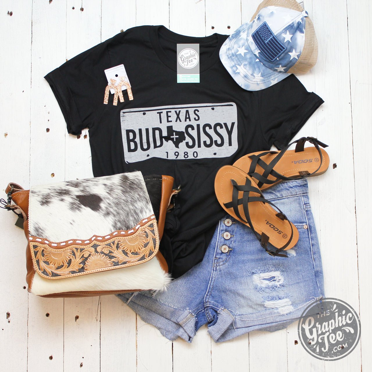 Black short sleeve T-shirt by The Graphic Tee featuring Bud & Sissy graphic design, casual fit, and soft cotton fabric.