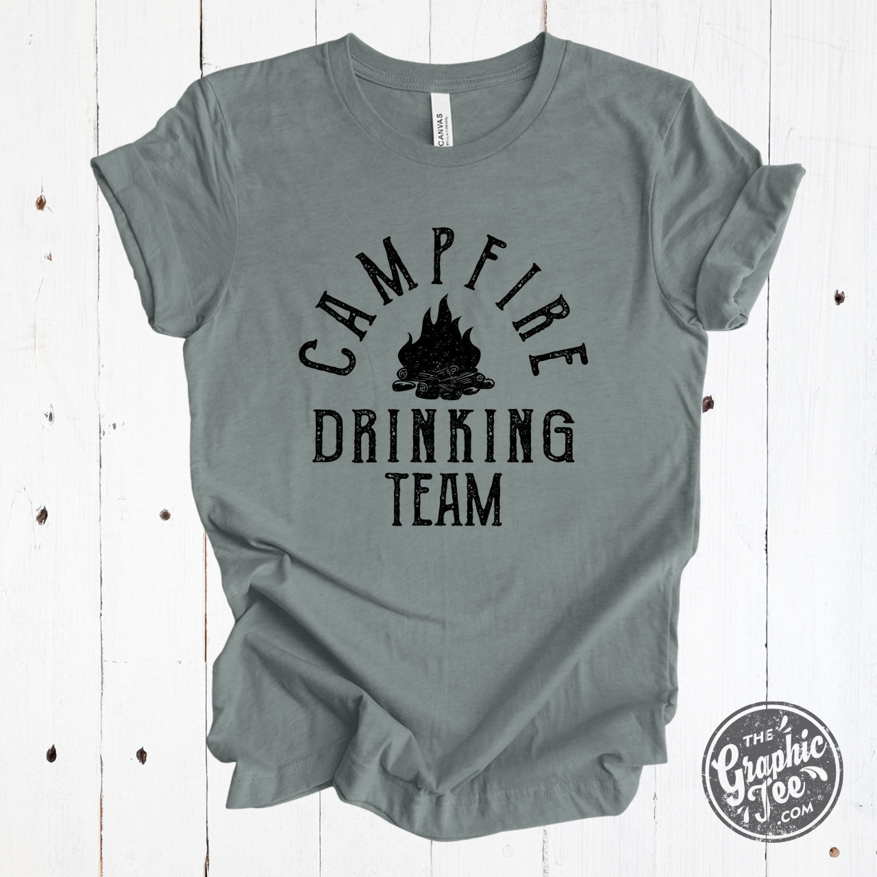 Heather blue Storm short sleeve graphic tee featuring a campfire and drinking design by The Graphic Tee.