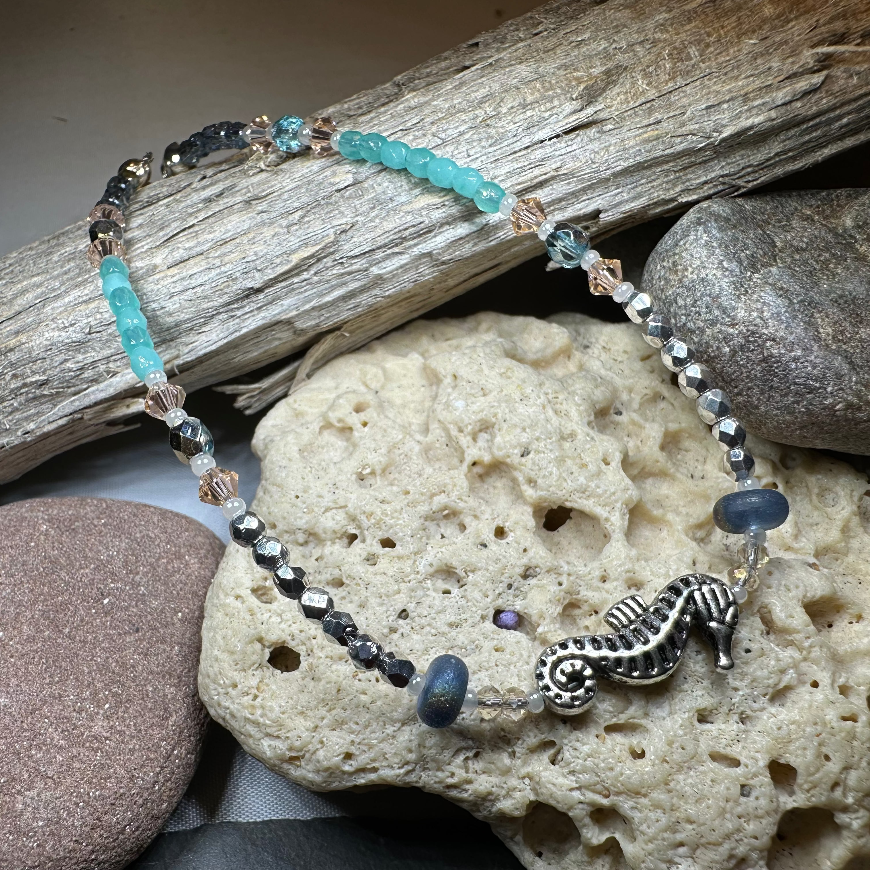 Green and pink Beachy Seahorse ankle bracelet by Celtic Crystal Design Jewelry featuring seahorse charms and beach-inspired design.