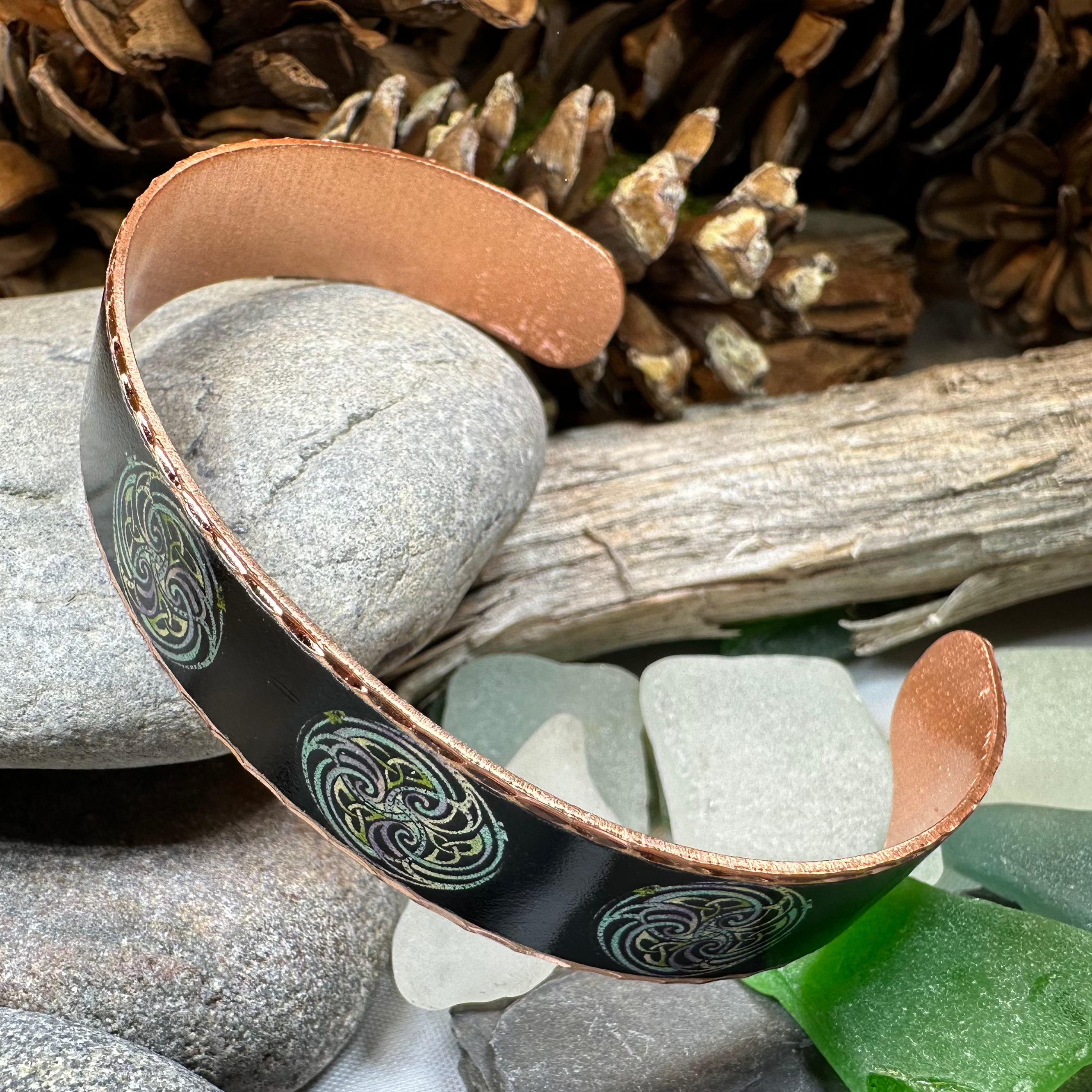 Mystical Celtic Spiral Copper Cuff Bracelet by Celtic Crystal Design Jewelry featuring intricate spiral patterns and handcrafted copper details.
