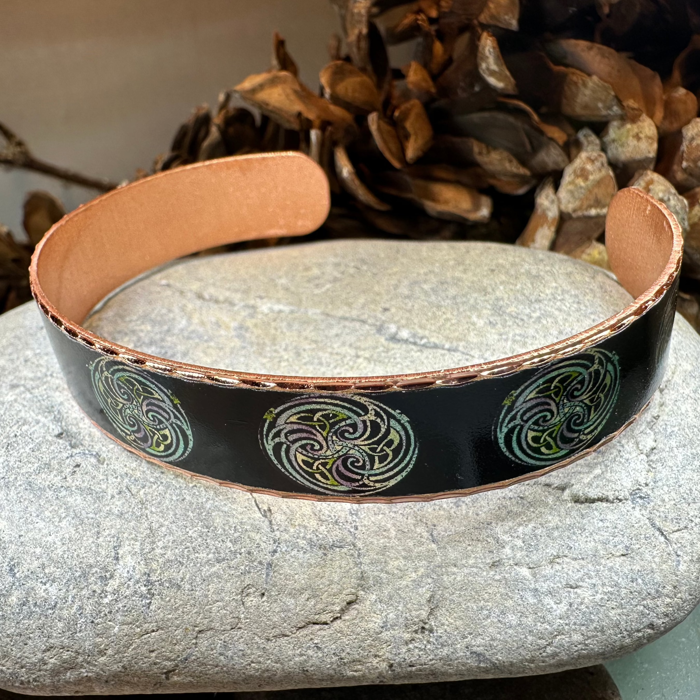 Mystical Celtic Spiral Copper Cuff Bracelet featuring intricate Celtic knot design from Celtic Crystal Design Jewelry.