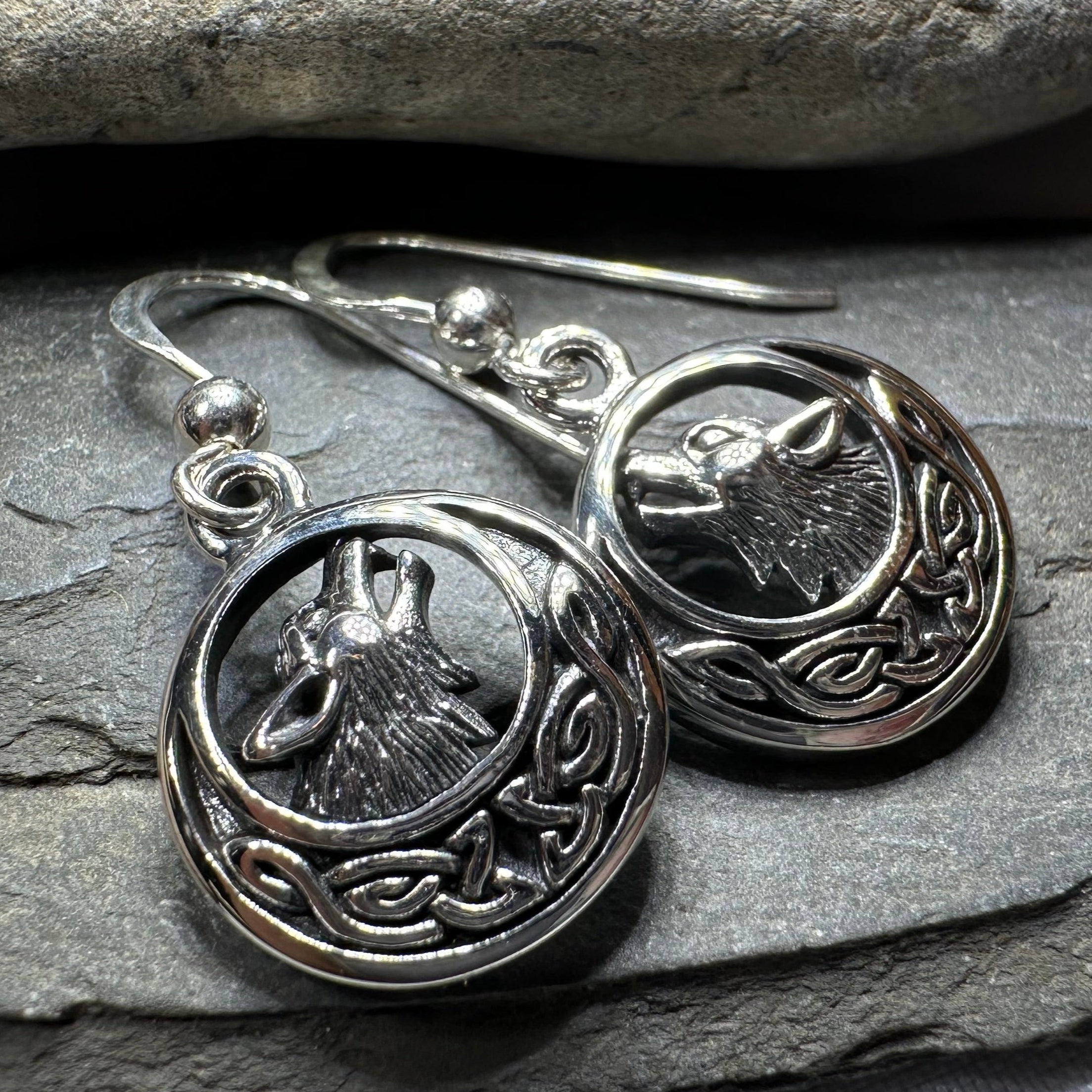 Celtic Wolf Spirit Dangle Earrings by Celtic Crystal Design Jewelry, featuring intricate Celtic wolf motifs in silver-tone metal.