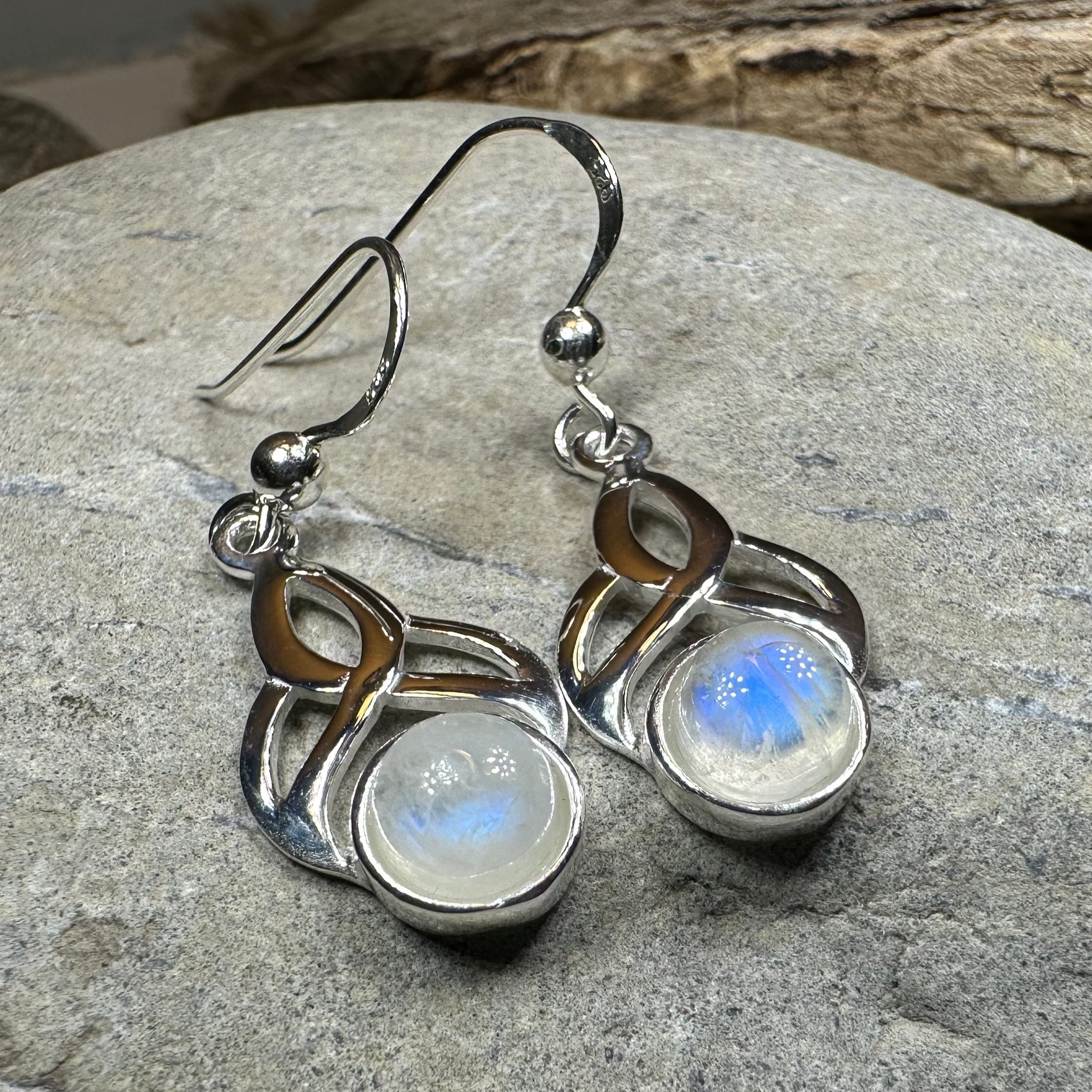 Edana Celtic Moonstone Dangle Earrings by Celtic Crystal Design Jewelry featuring moonstone gemstones and intricate Celtic patterns.