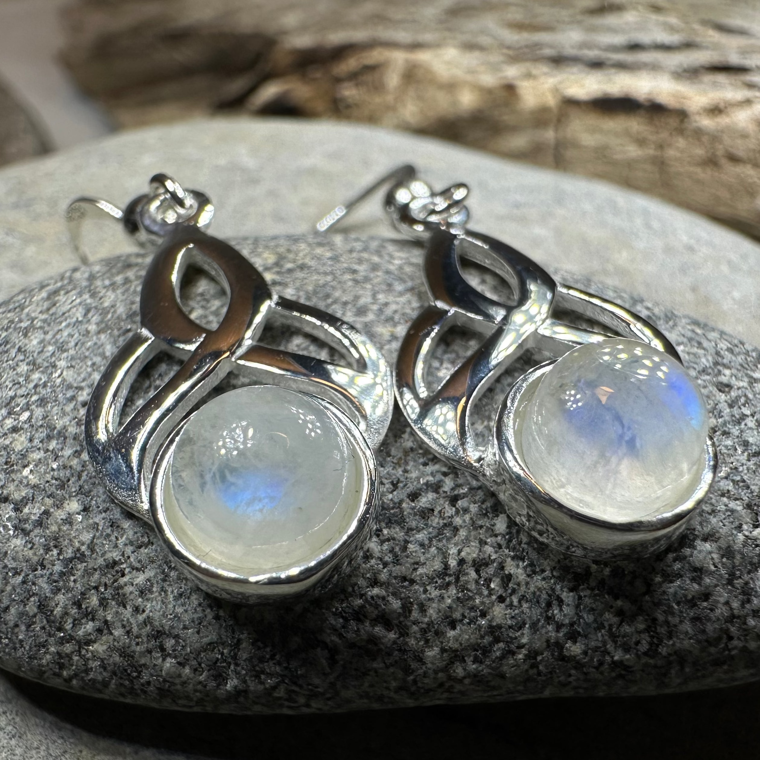 Edana Celtic Moonstone Dangle Earrings by Celtic Crystal Design Jewelry featuring shimmering moonstone gemstones and intricate Celtic detailing.