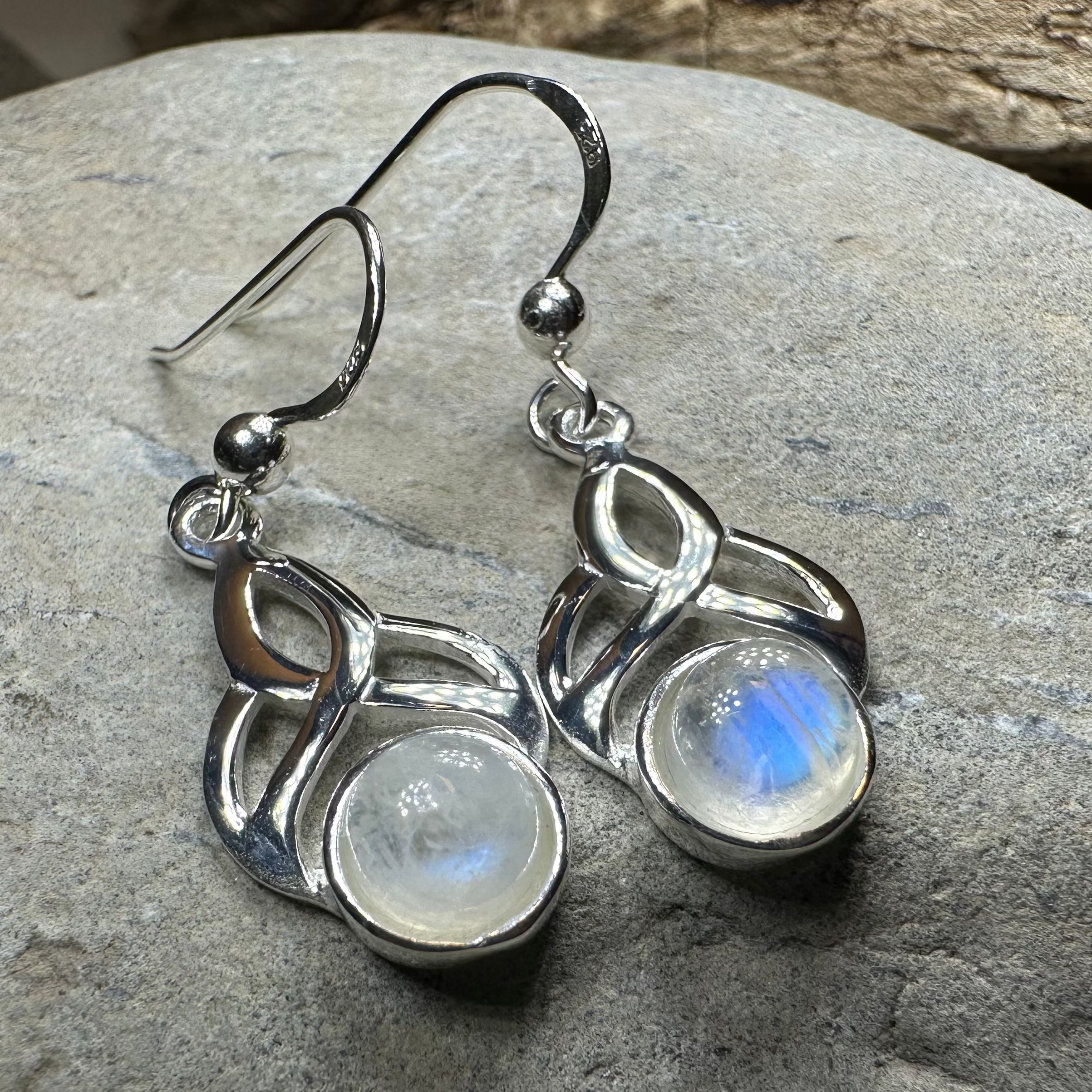 Edana Celtic Moonstone Dangle Earrings by Celtic Crystal Design Jewelry featuring Celtic-inspired silver settings and luminous moonstone stones.