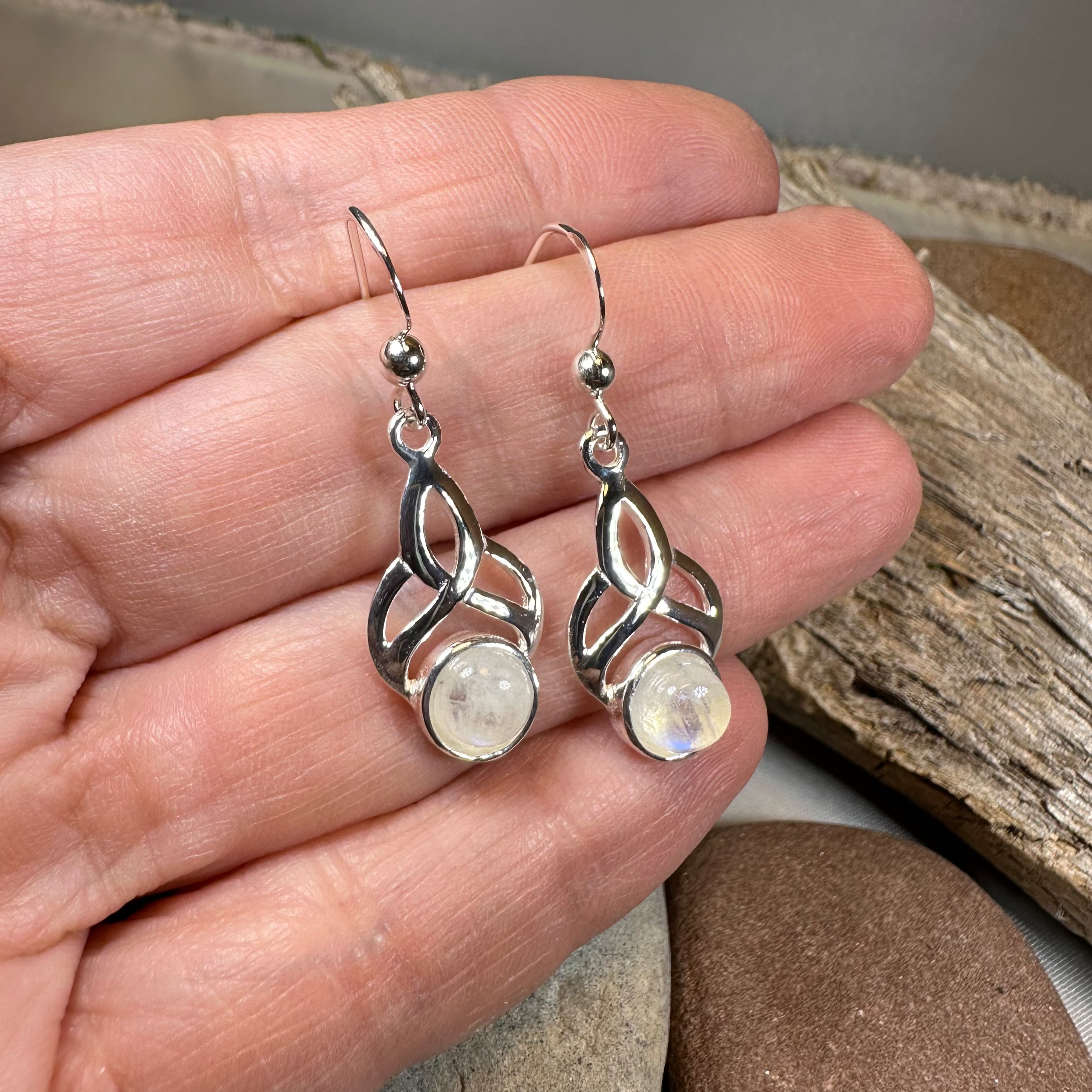 Edana Celtic Moonstone Dangle Earrings by Celtic Crystal Design Jewelry featuring moonstone gemstones and intricate Celtic detailing.