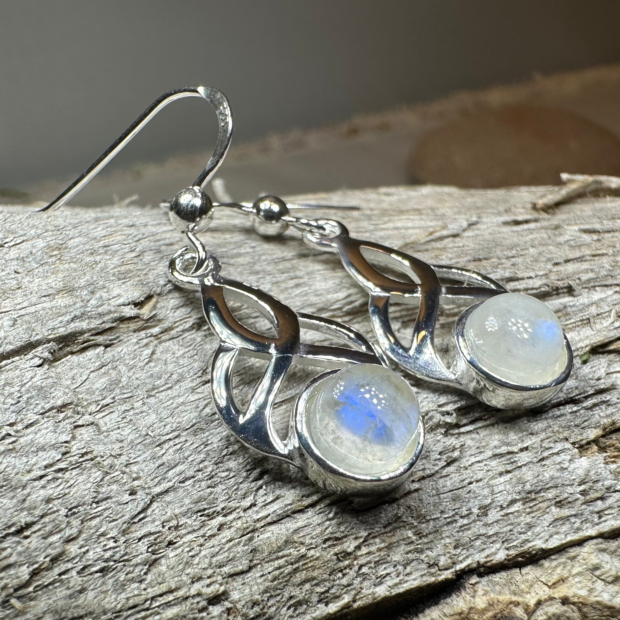 Edana Celtic Moonstone Dangle Earrings by Celtic Crystal Design Jewelry featuring moonstone gemstones and intricate Celtic detailing.