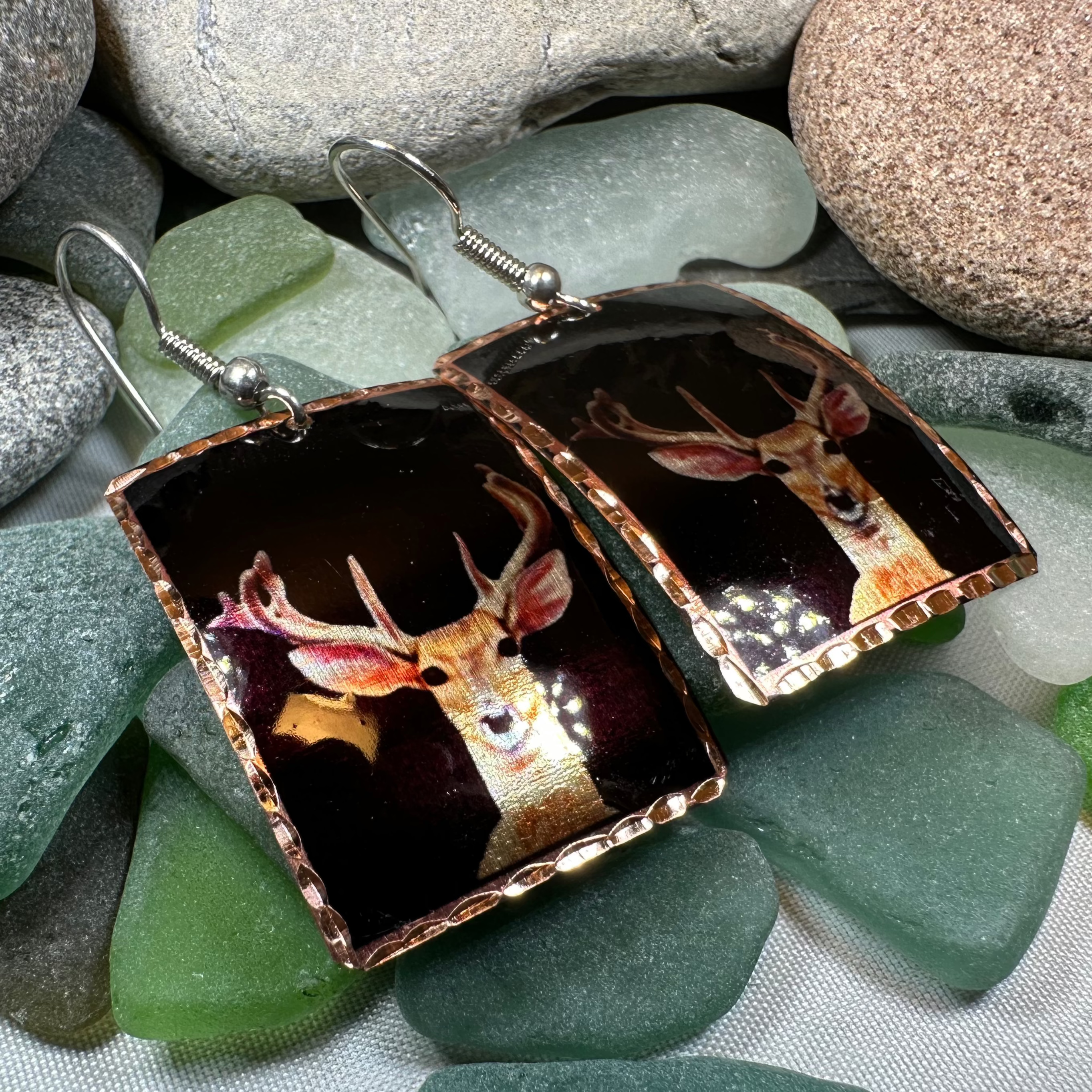 Celtic Crystal Design Jewelry Highland Stag Copper Dangle Earrings with intricate Celtic detailing and stag motif.