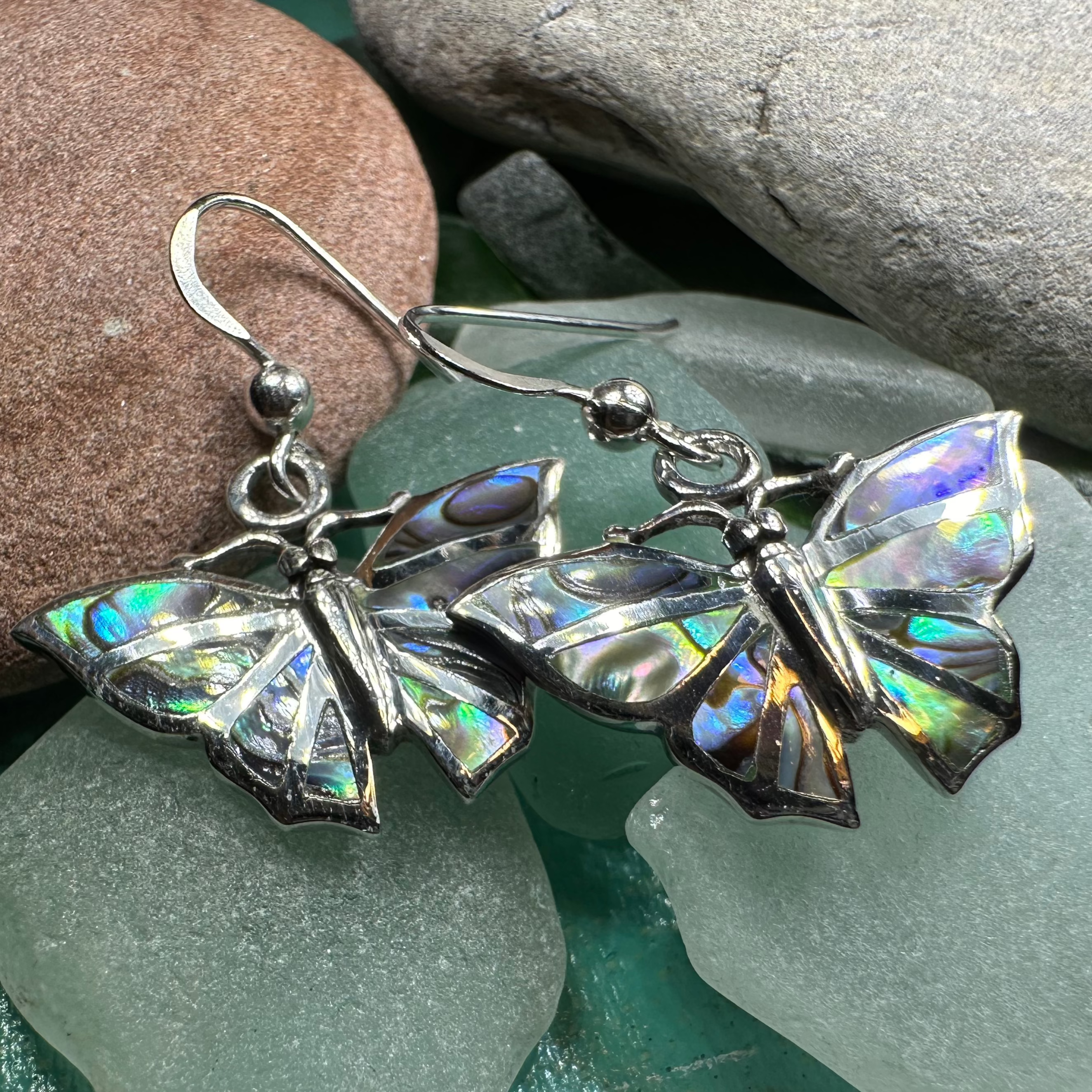 Celtic Crystal Design Jewelry Josseline Butterfly Dangle Earrings featuring delicate butterfly charms and shimmering crystal accents.