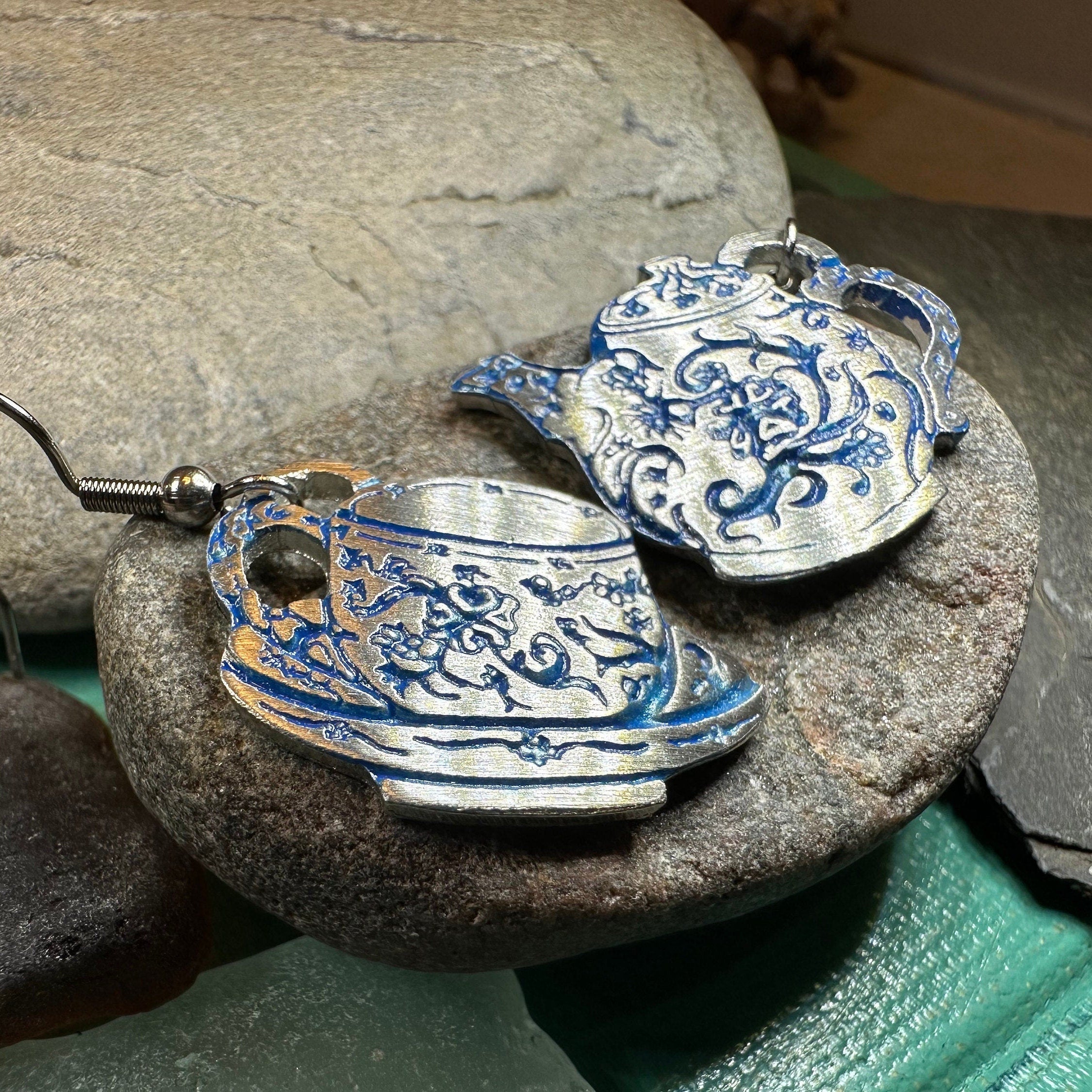 Celtic Crystal Design Jewelry dangle earrings featuring old-fashioned teapot and cup motifs, crafted in detailed metalwork.