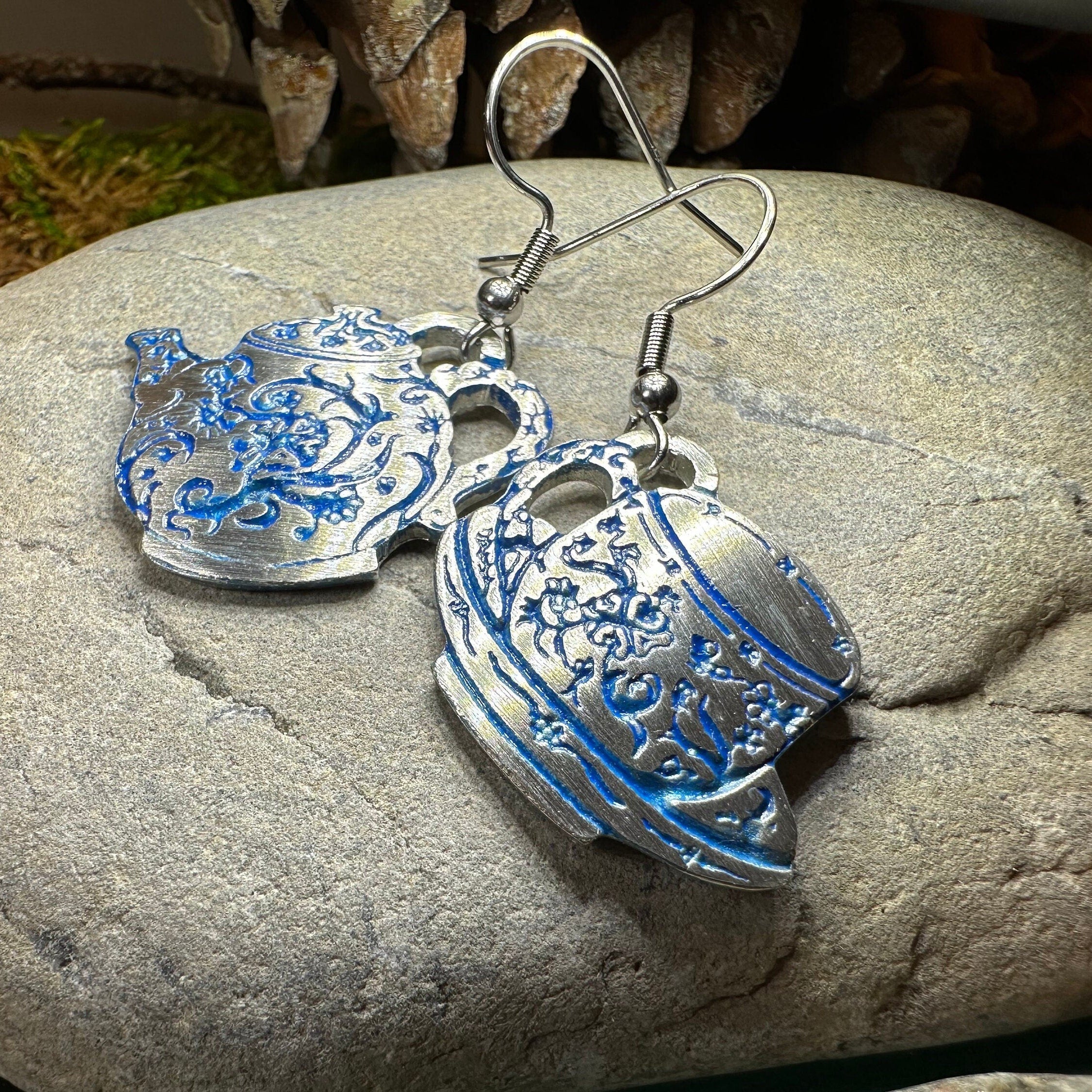 Celtic Crystal Design Jewelry dangle earrings featuring old-fashioned teapot and cup charms, crafted in silver with intricate details.
