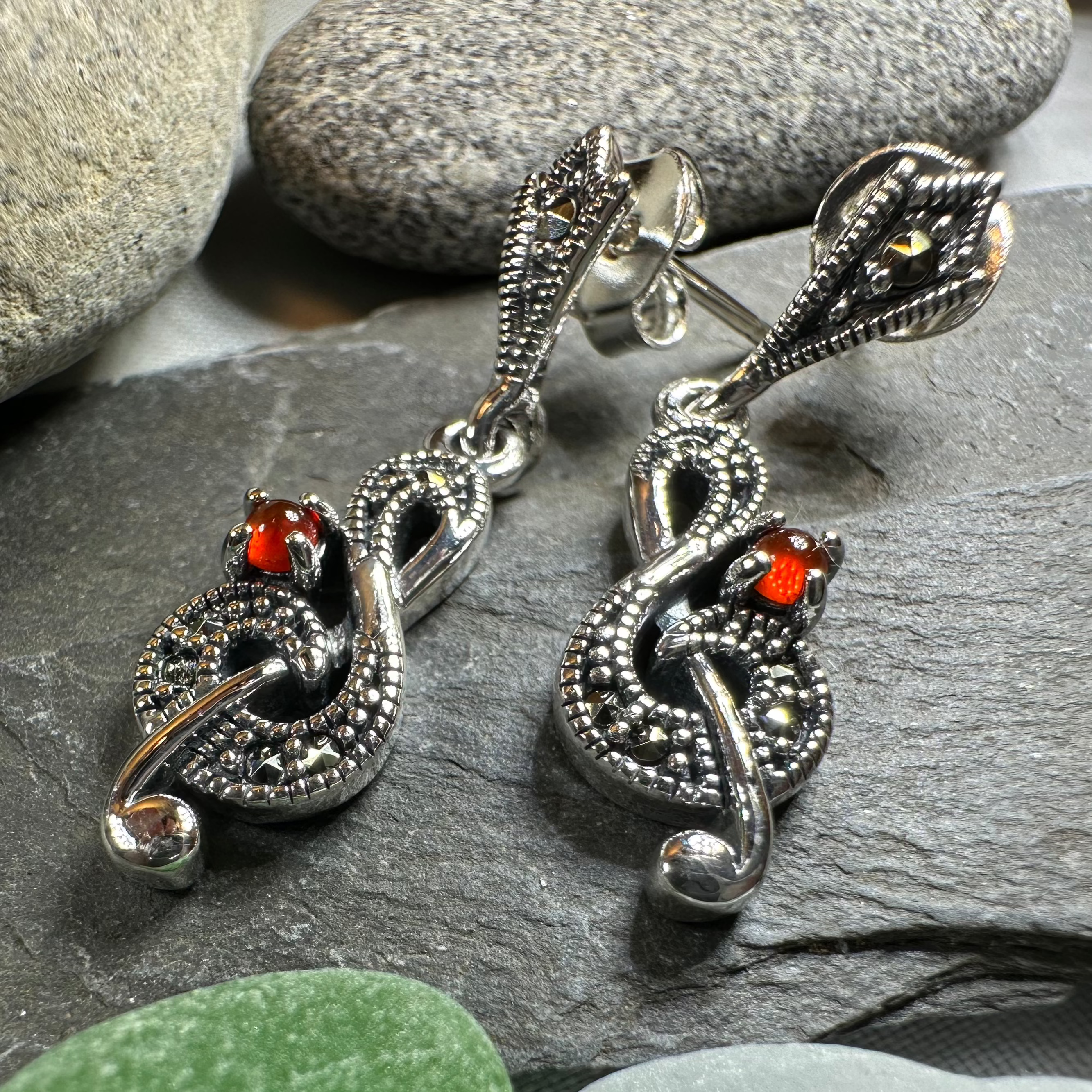 Celtic Crystal Design Jewelry Rhapsody music note dangle earrings with intricate detailing and silver-tone finish.