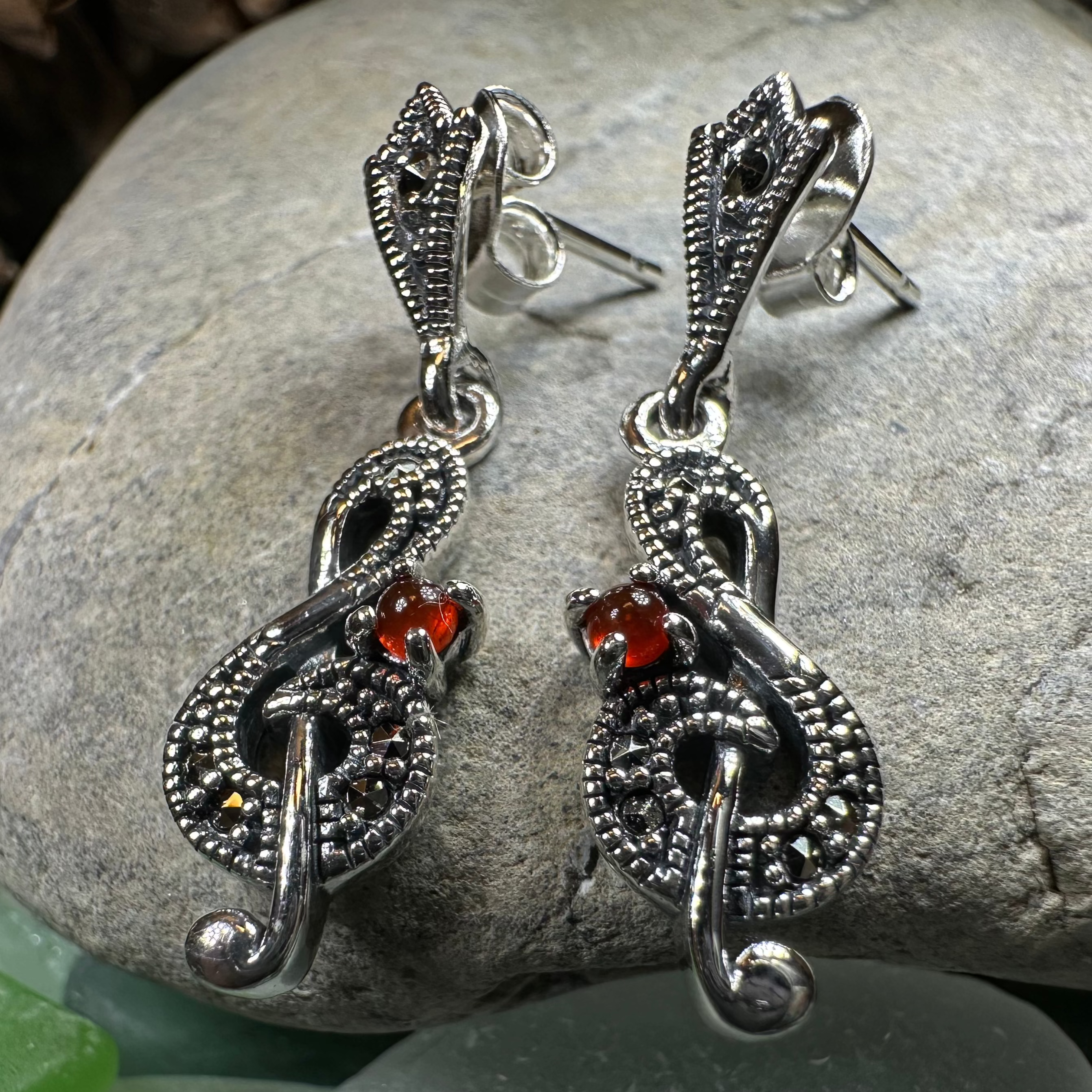 Celtic Crystal Design Jewelry Rhapsody music note dangle earrings featuring silver-tone musical note charms.