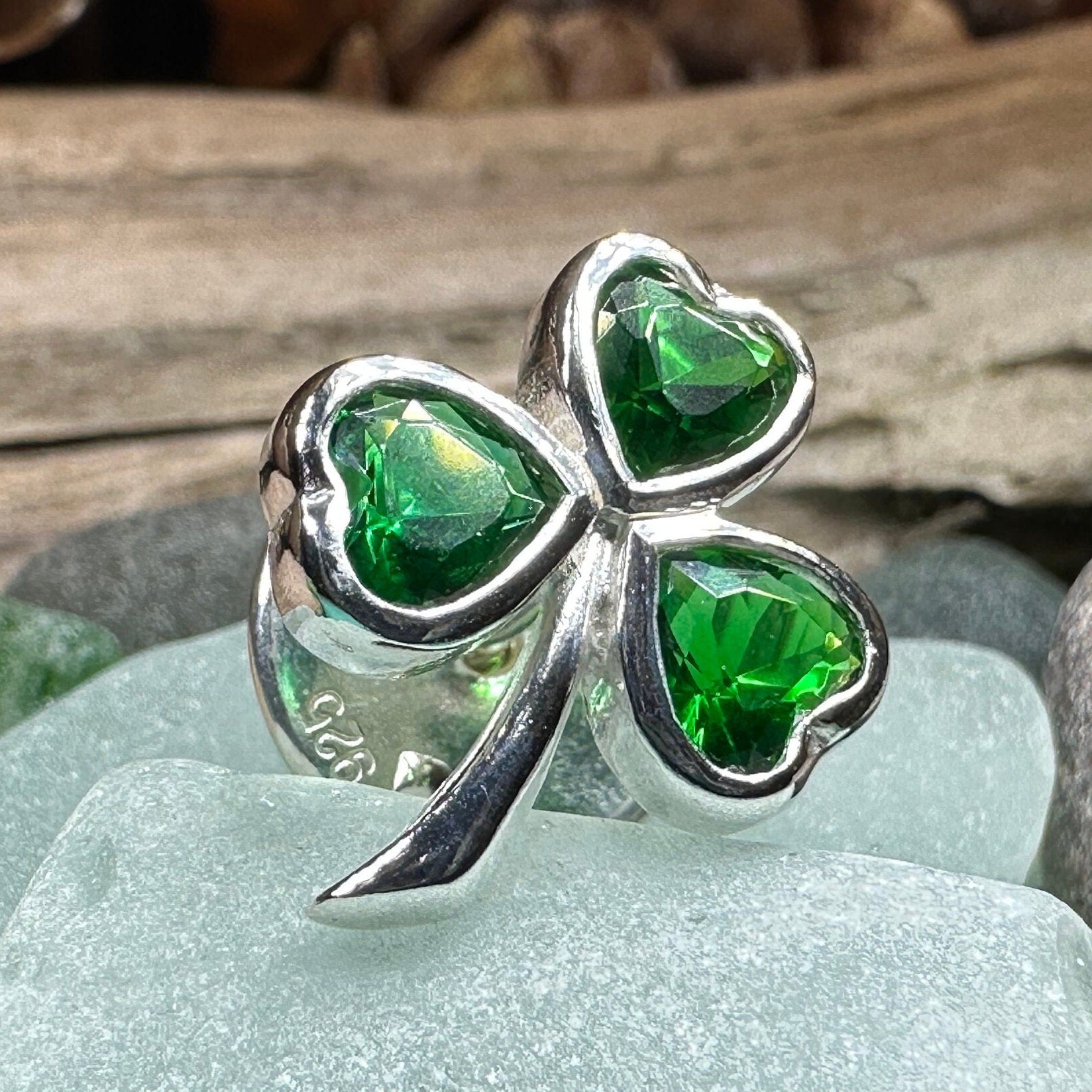 Celtic Crystal Design Jewelry Irish Emerald Shamrock lapel pin featuring a detailed green shamrock symbol on a metallic backing.