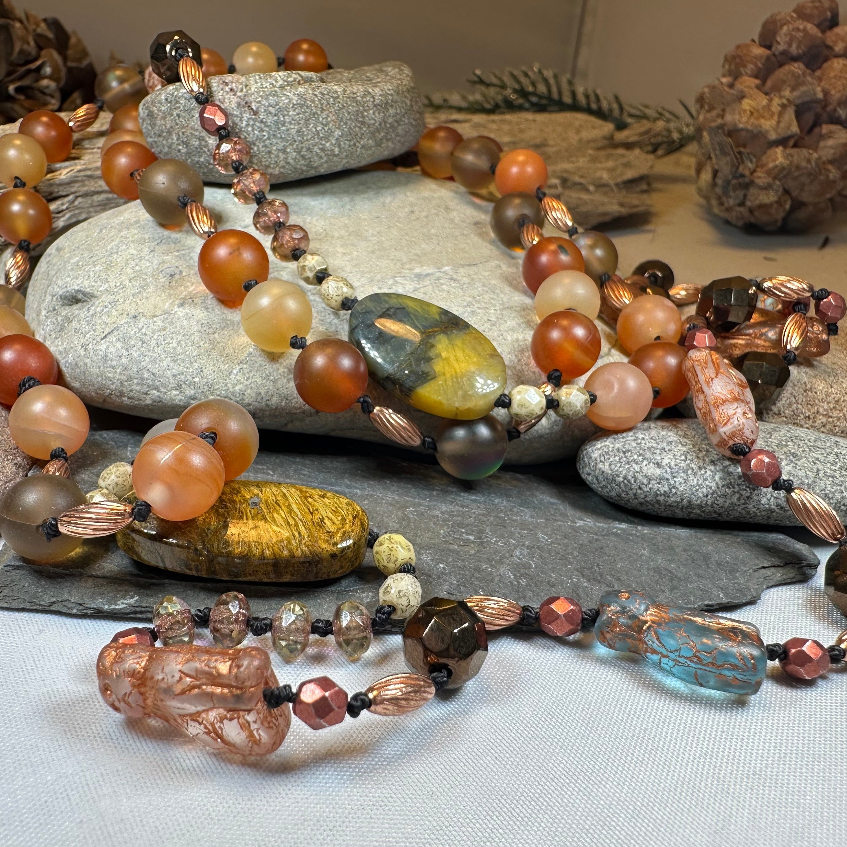 Copper Autumn Cat Long Necklace from Celtic Crystal Design Jewelry, featuring a detailed feline pendant on a long chain.