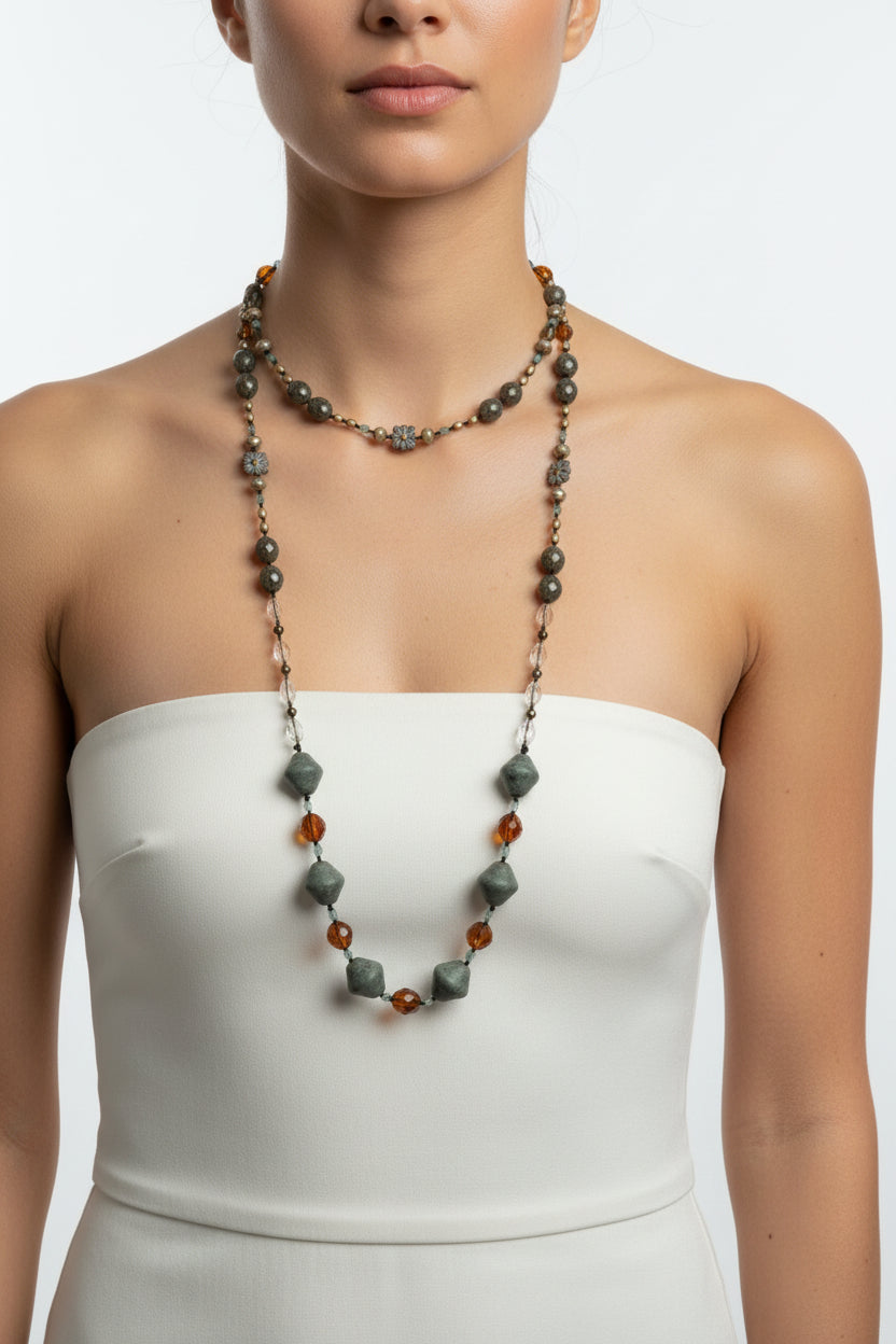 Celtic Crystal Design Jewelry Duneflower Mist long necklace with intricate pendant and elegant chain, showcasing detailed craftsmanship.