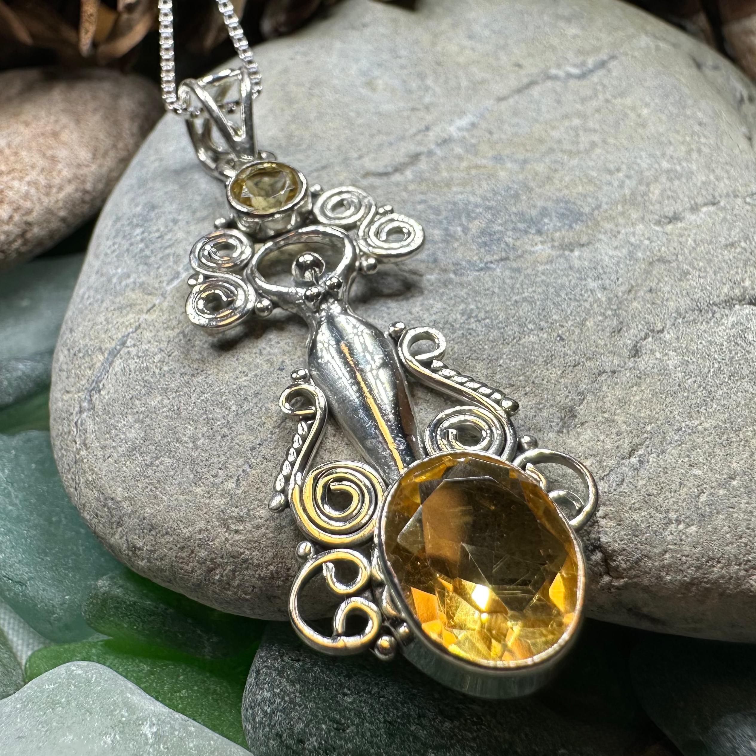 Celtic Crystal Design Jewelry Rising Goddess Necklace pendant with an oval citrine gemstone, elegant jewelry piece.
