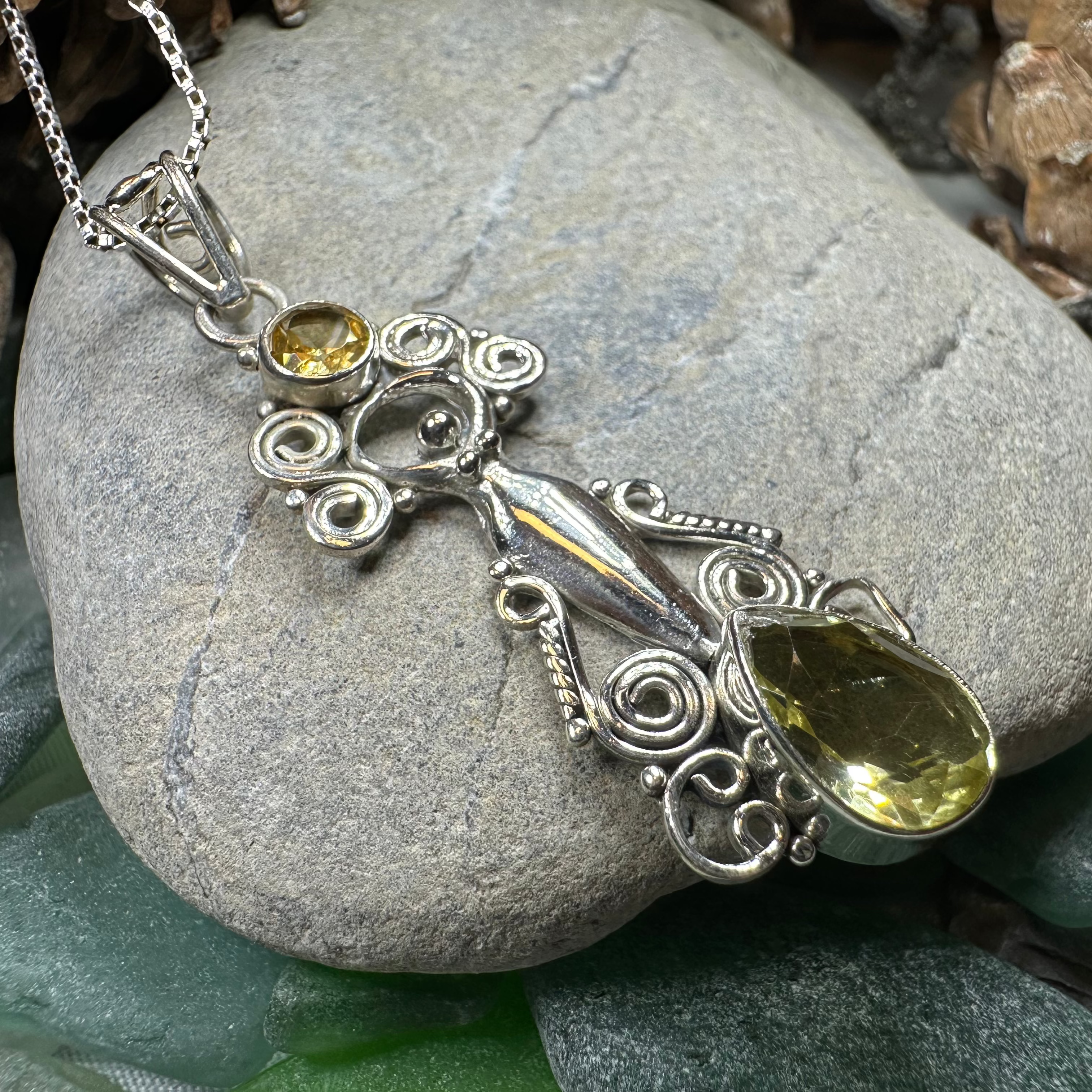 Celtic Crystal Design Jewelry Rising Goddess Necklace pendant featuring an oval citrine stone on a delicate chain.
