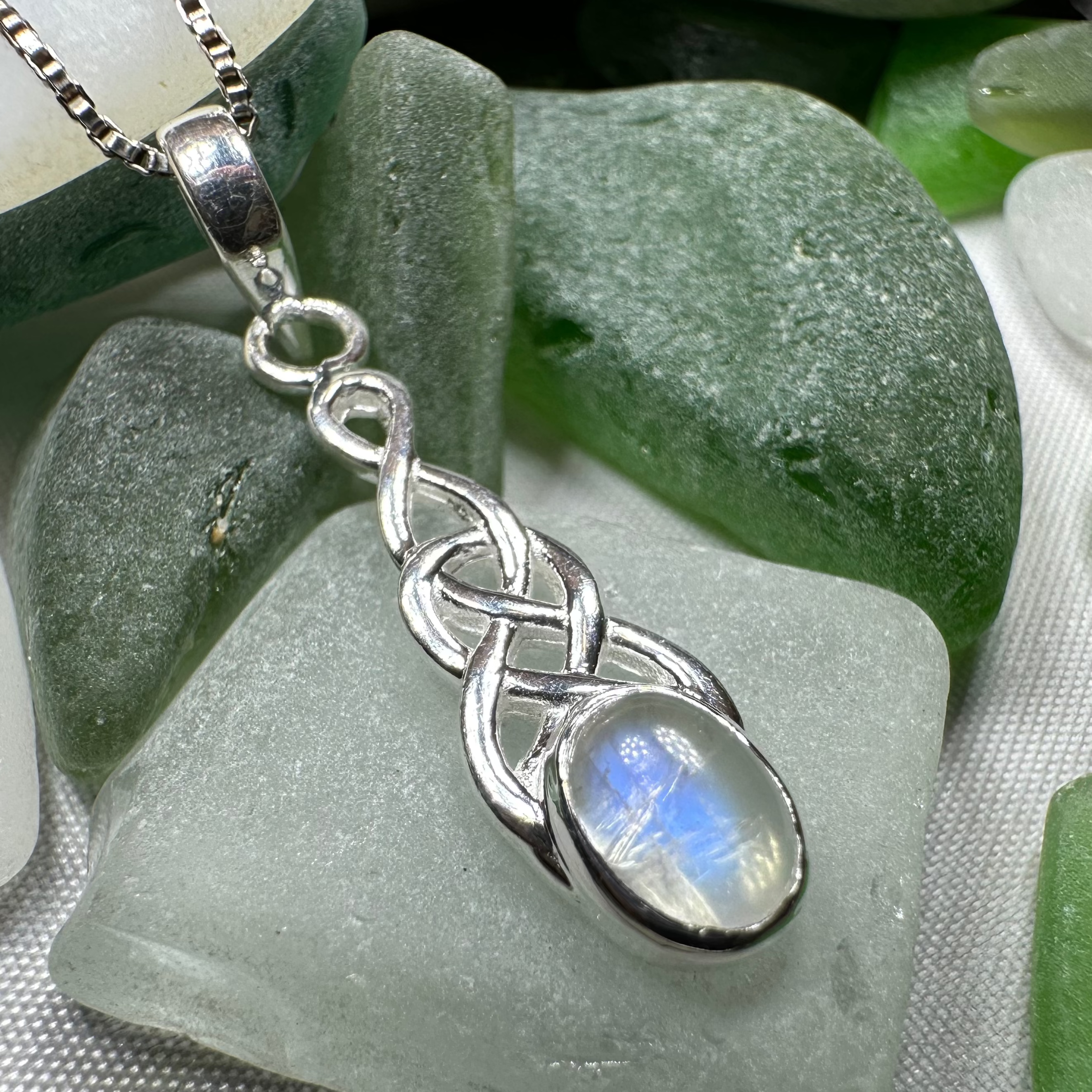 Celtic Crystal Design Jewelry Dublin Celtic Knot pendant necklace featuring intricate knot design and sparkling crystal accents.