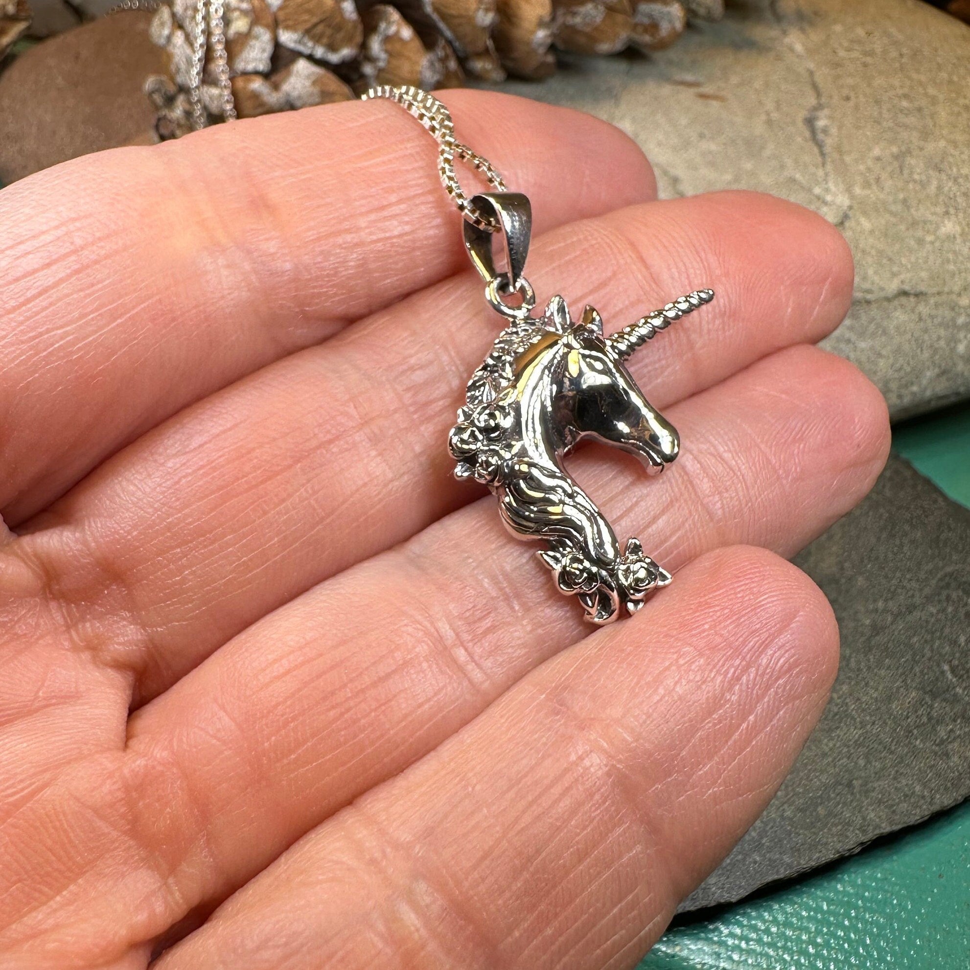 Celtic Crystal Design Jewelry Gwenllian unicorn pendant necklace featuring a detailed mythical unicorn charm on a silver chain.