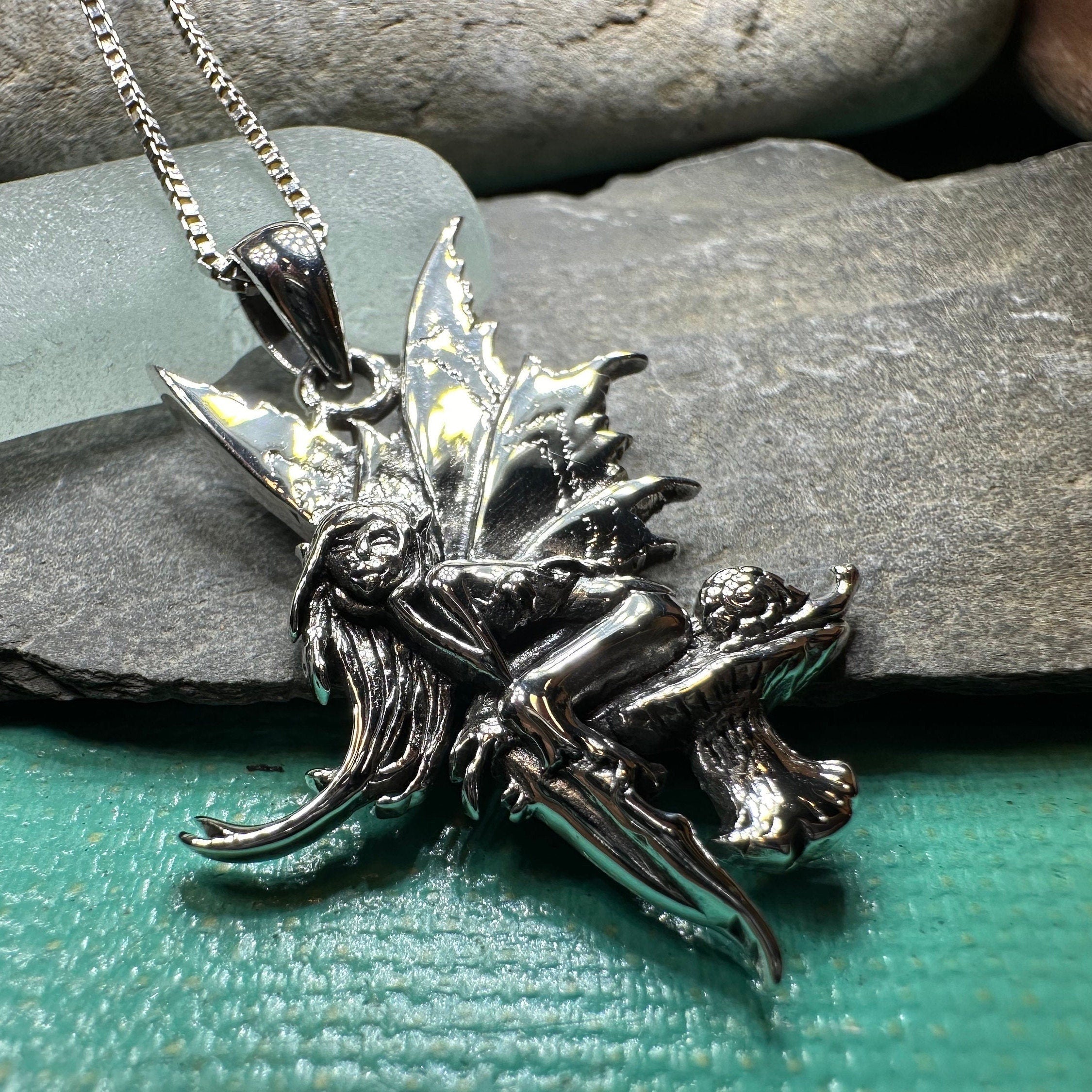 Celtic Crystal Design Jewelry Toadstool Fairy Necklace pendant with intricate fairy and mushroom design, silver-tone metal.
