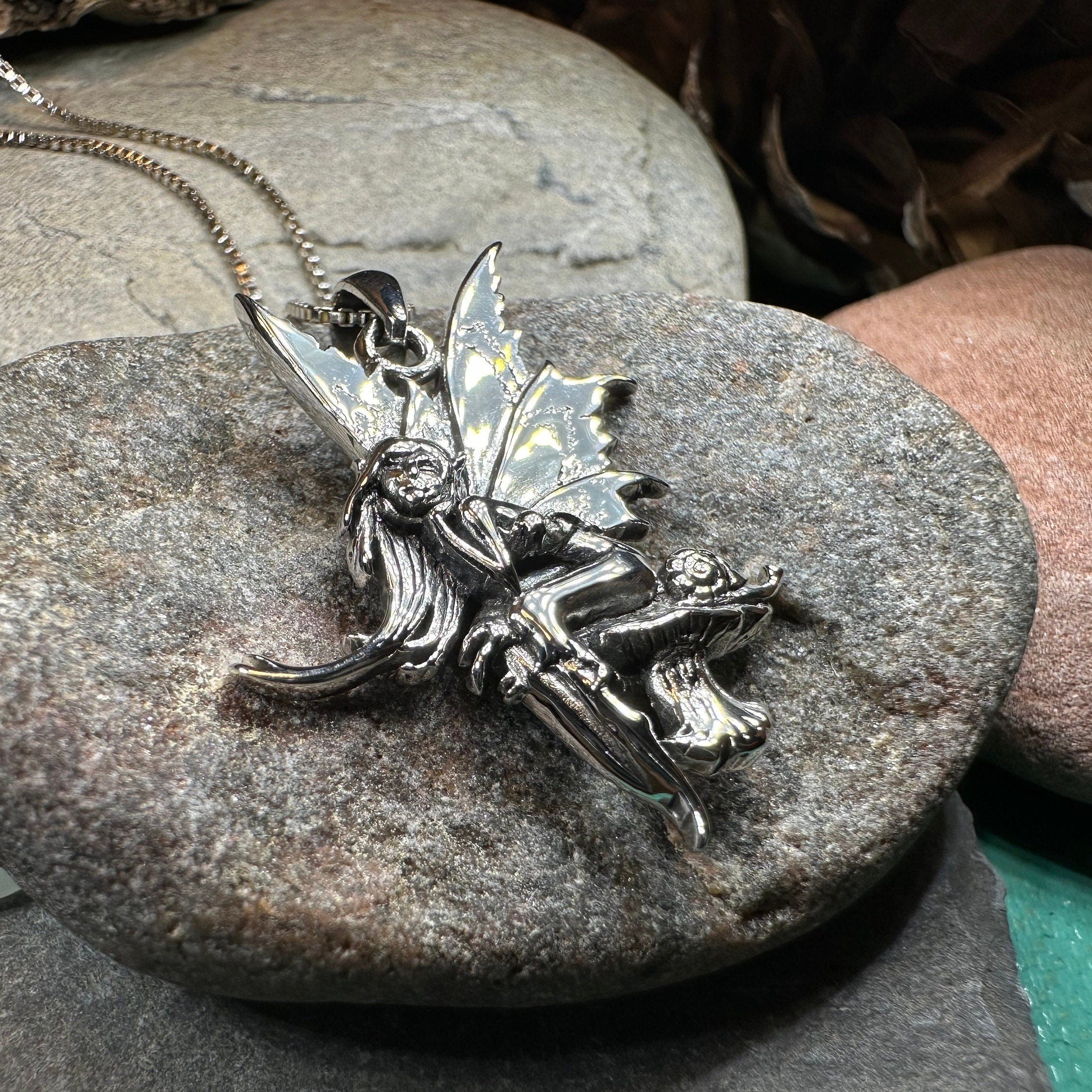 Celtic Crystal Design Fairy Necklace pendant featuring a detailed toadstool fairy charm, crafted in silver-tone metal.