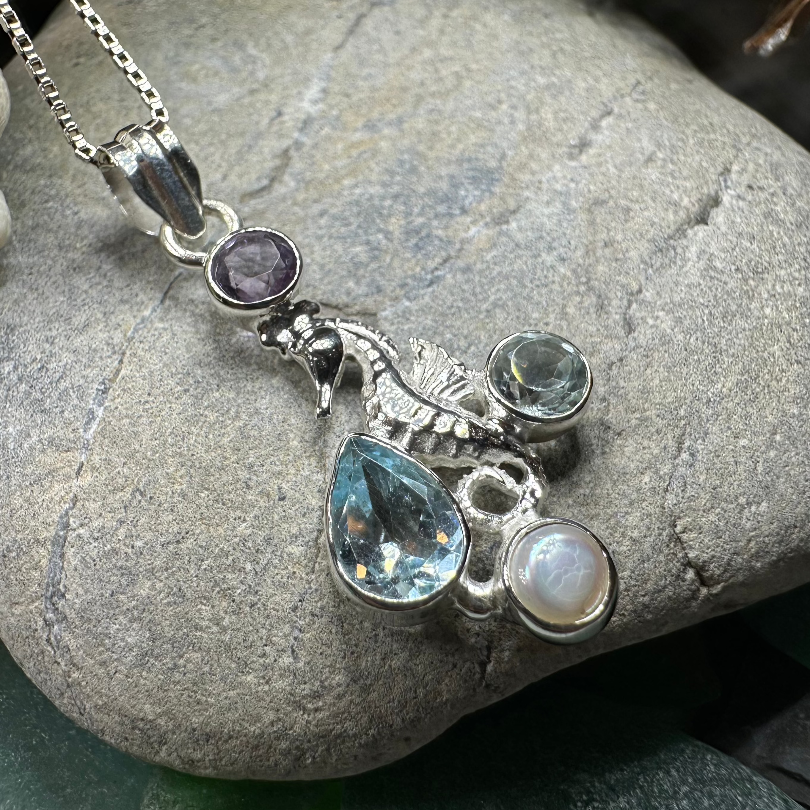Celtic Crystal Design Jewelry Seamist Seahorse Necklace pendant featuring topaz and amethyst gemstones on a silver chain.