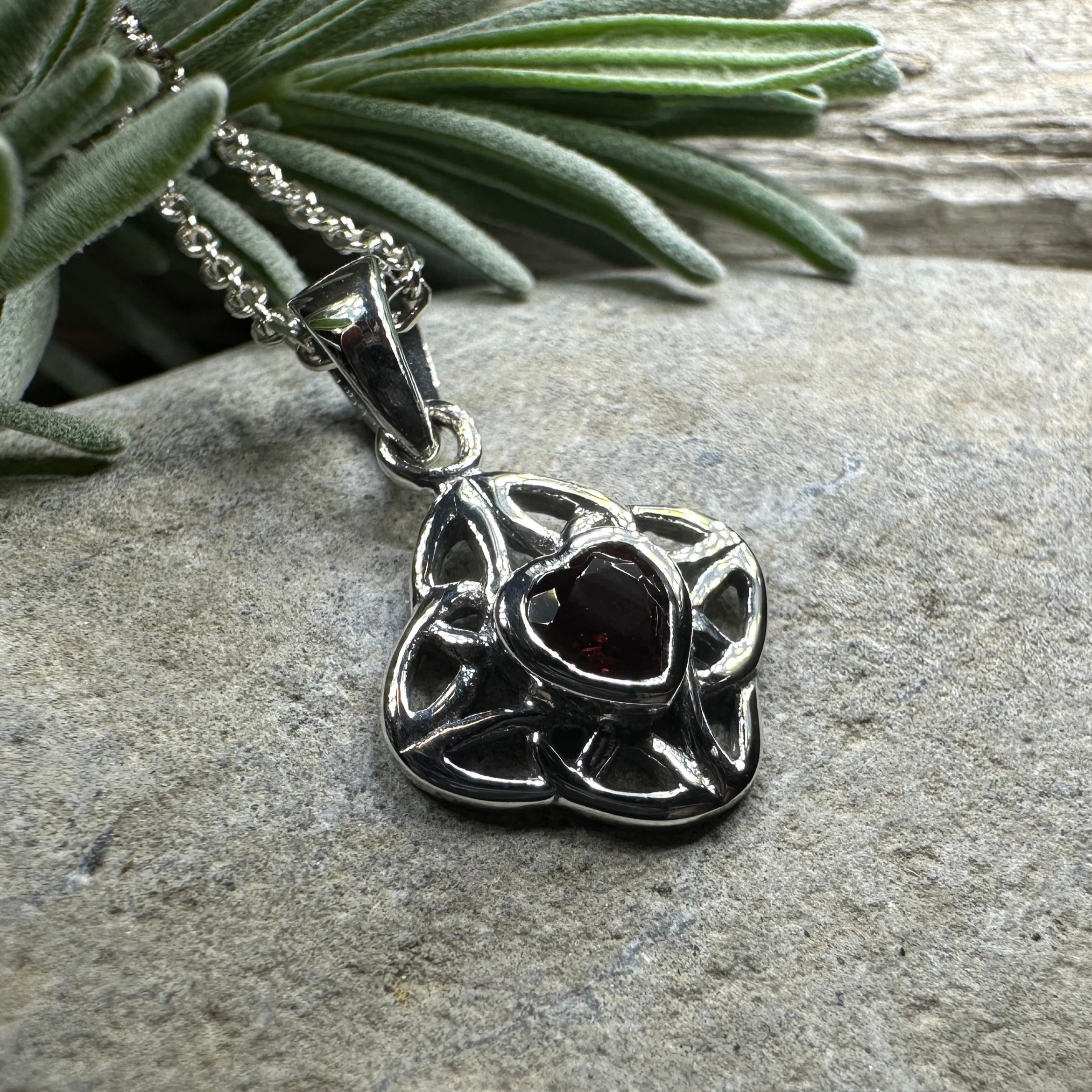 Amethyst Celtic knot pendant necklace by Celtic Crystal Design Jewelry featuring an intricate Celtic knot design.