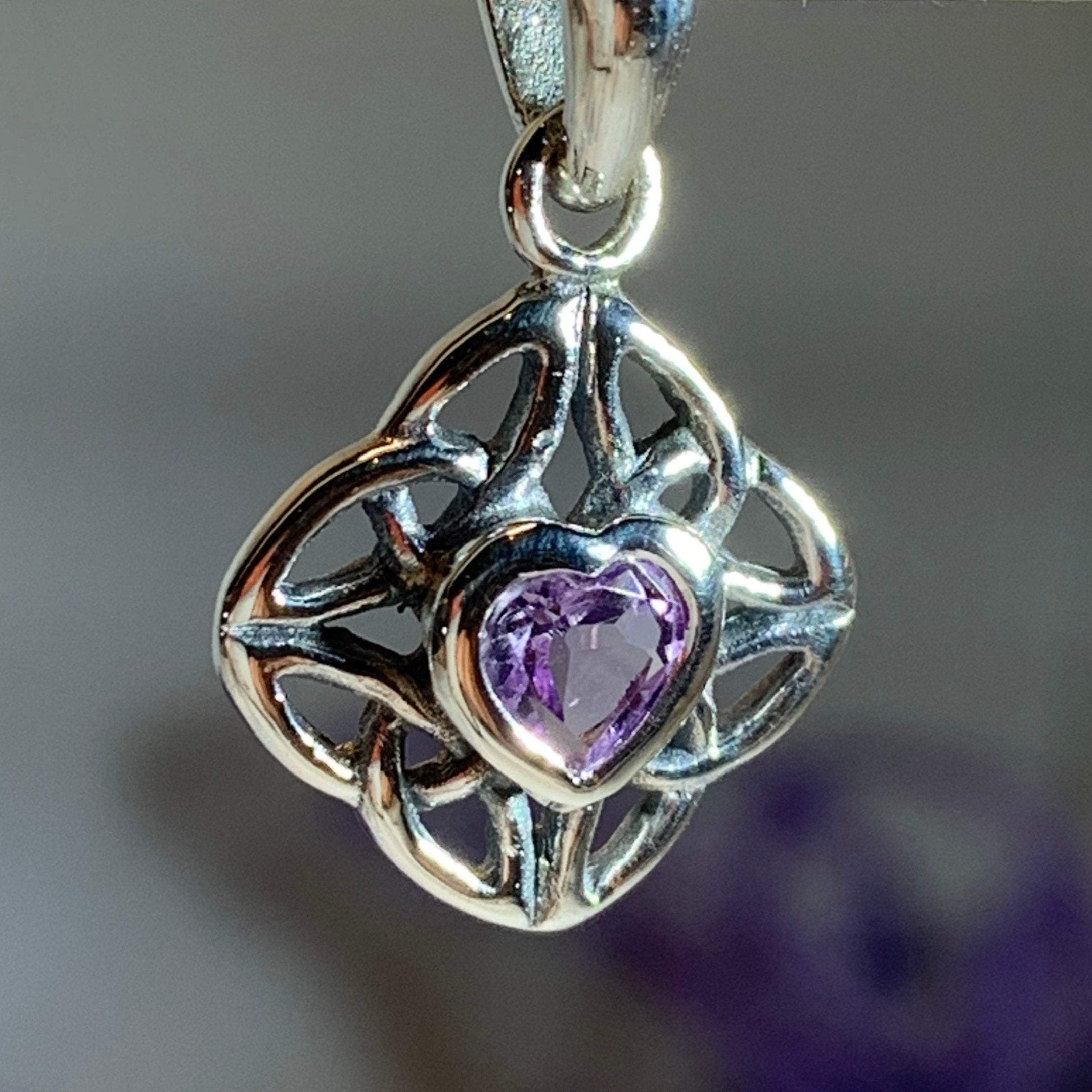 Amethyst Celtic knot pendant necklace by Celtic Crystal Design Jewelry featuring an intricate Celtic knot design.