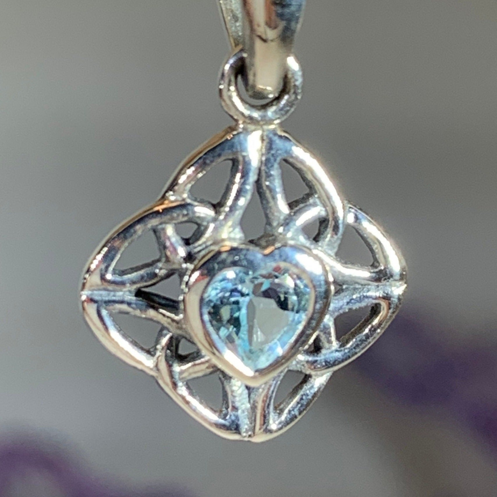 Ashley Celtic Knot Necklace pendant with amethyst gemstone from Celtic Crystal Design Jewelry, showcasing intricate Celtic knot design.
