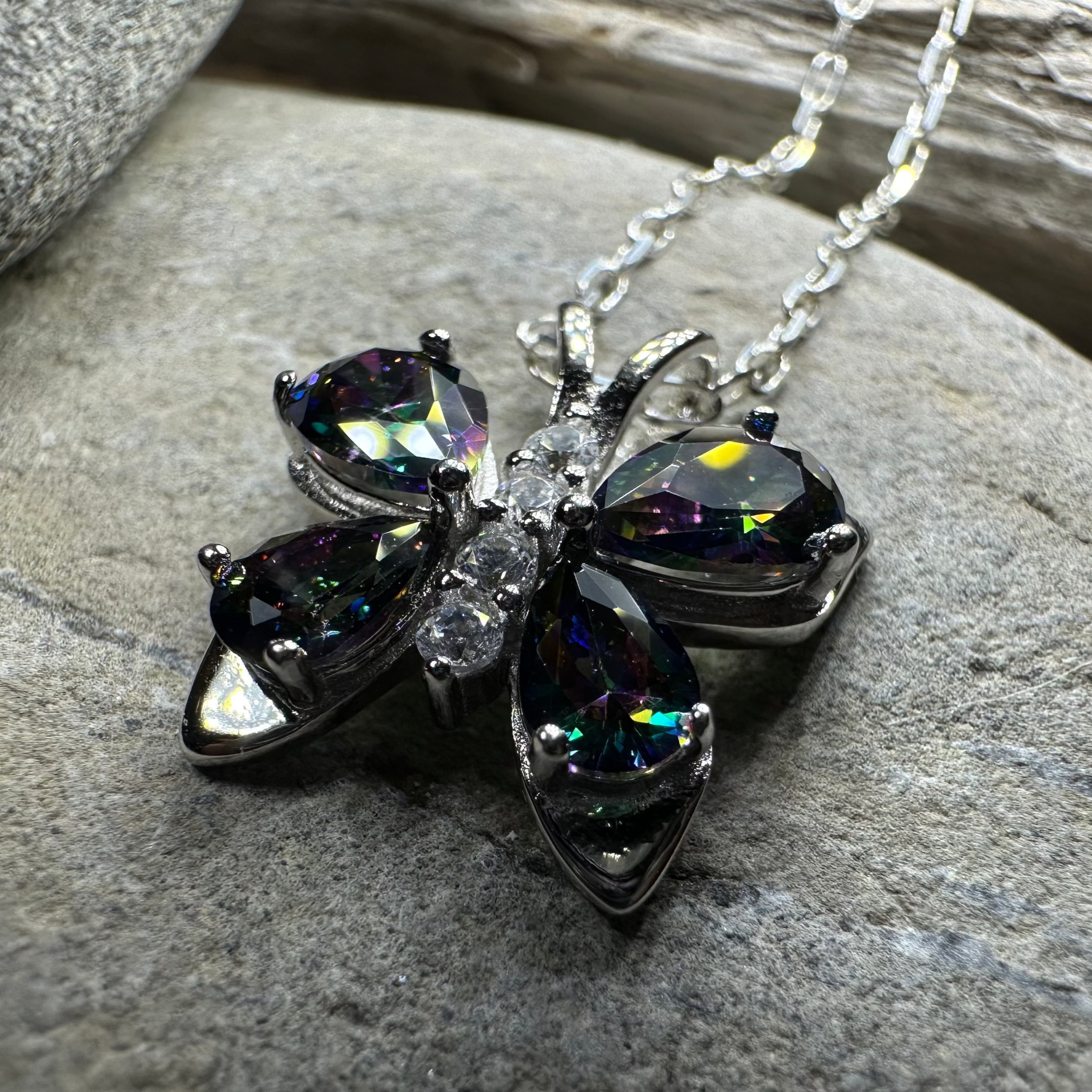 Celtic Crystal Design Jewelry Mystic Topaz Butterfly Pendant necklace featuring a sparkling topaz gemstone butterfly charm.