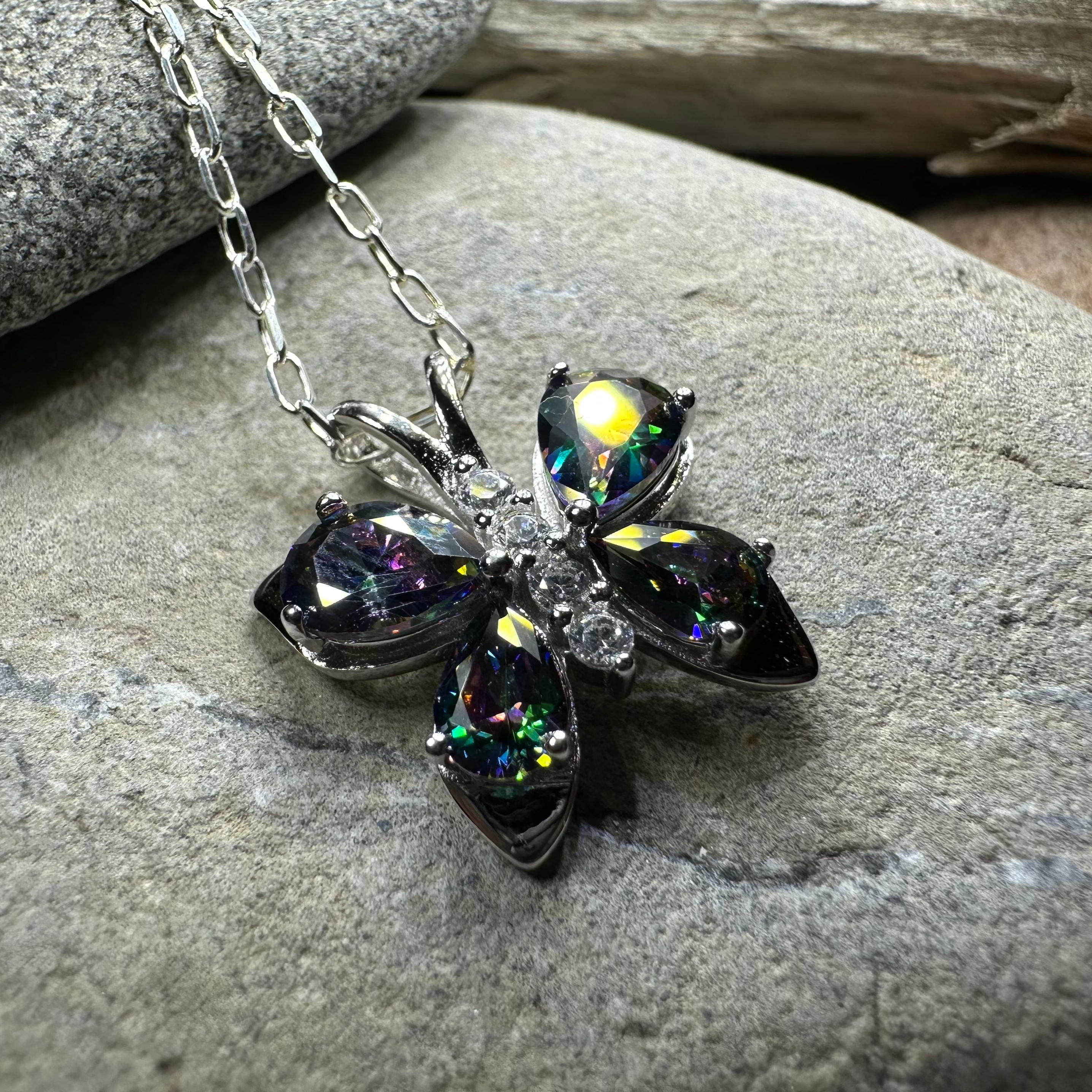 Celtic Crystal Design Jewelry Mystic Topaz butterfly pendant necklace with intricate Celtic details and sparkling gemstone.