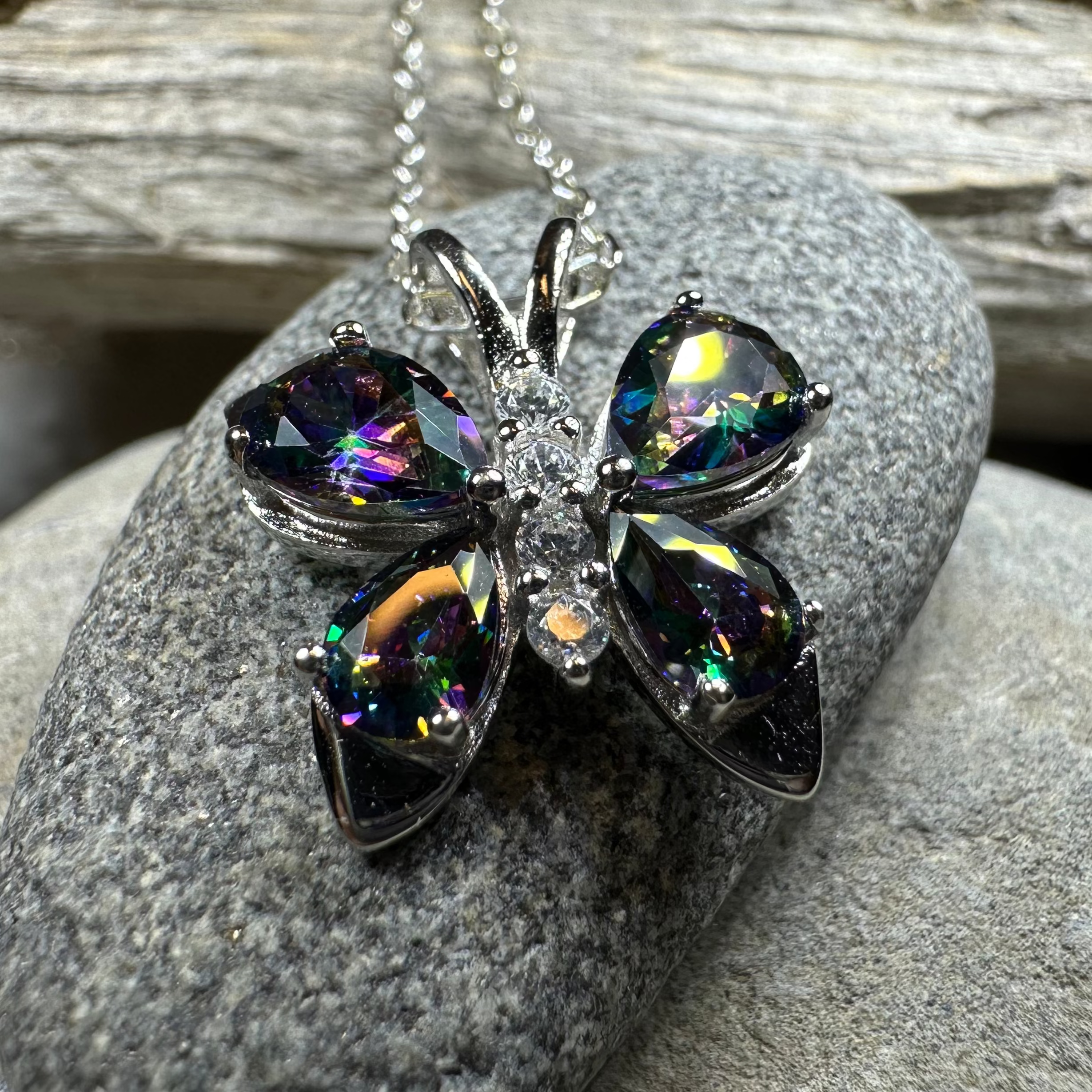 Celtic Crystal Design Jewelry Mystic Topaz Butterfly Pendant necklace featuring a sparkling topaz gemstone butterfly charm.