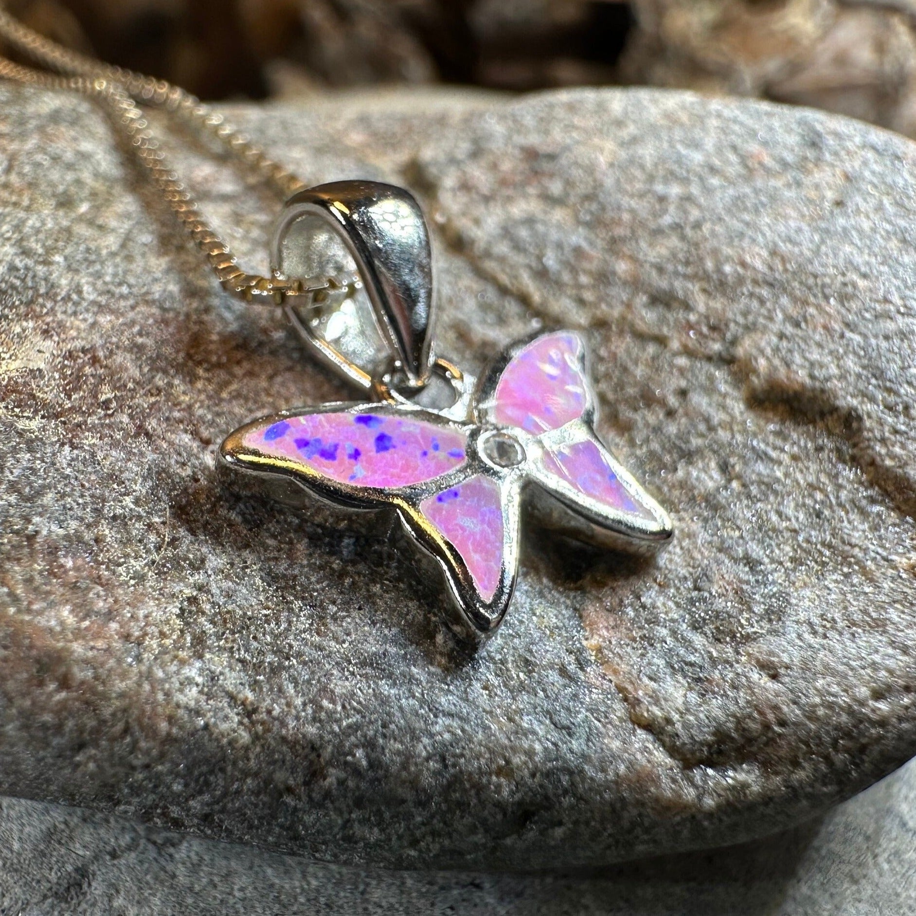 Pink opal butterfly pendant necklace by Celtic Crystal Design Jewelry, featuring a delicate petite butterfly pendant.