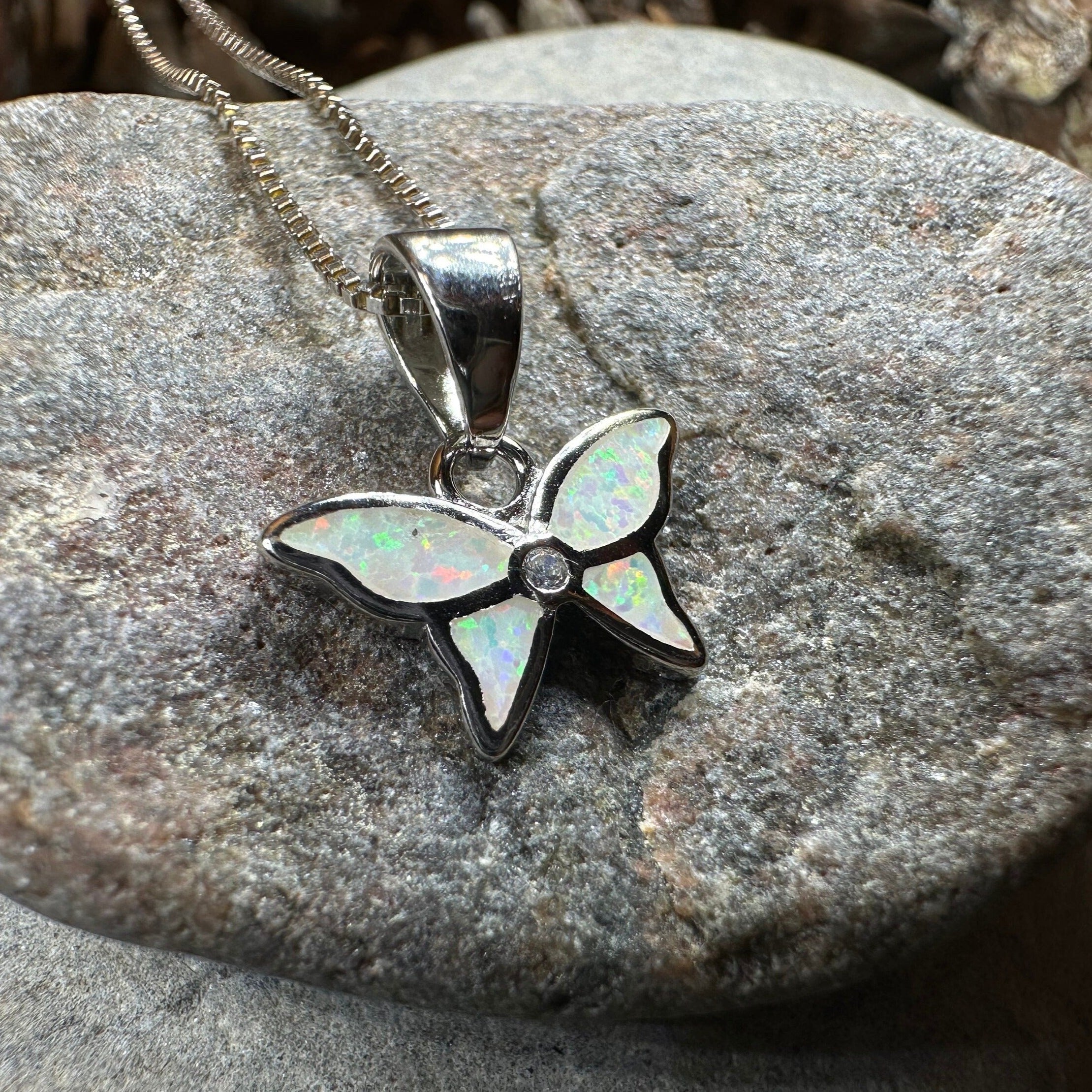 Pink opal butterfly pendant necklace by Celtic Crystal Design Jewelry, featuring a delicate petite butterfly pendant.