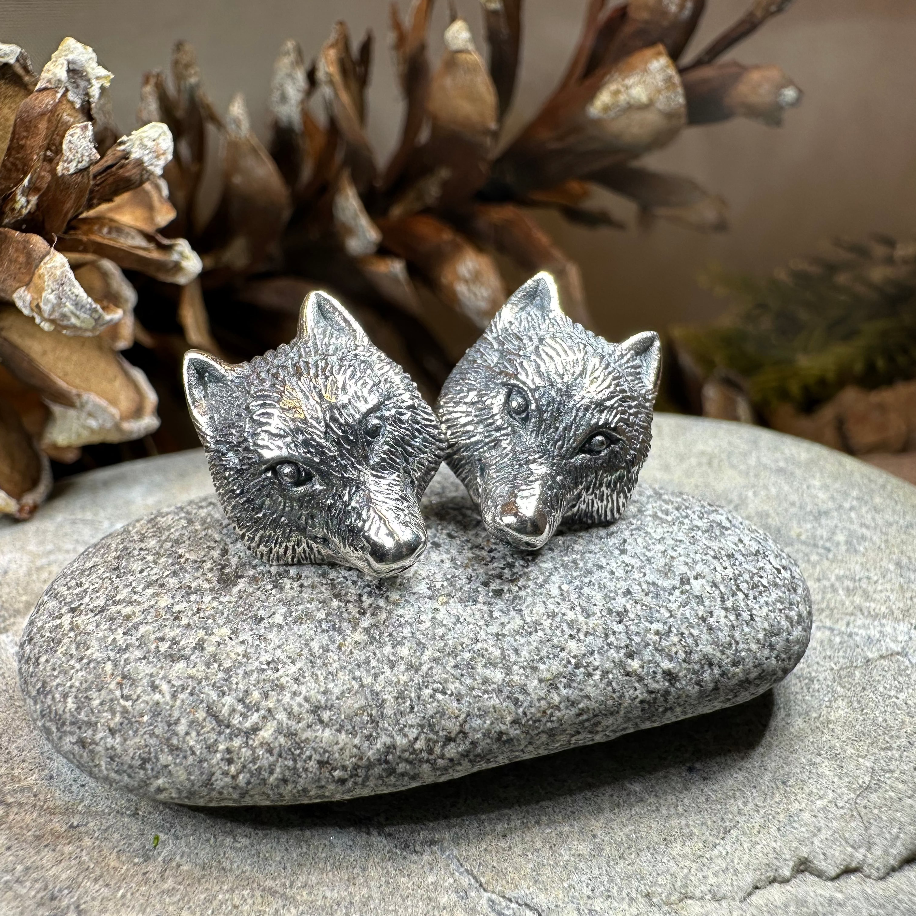 Forest Song Wolf Post Earrings by Celtic Crystal Design Jewelry featuring detailed wolf designs in silver-tone metal.