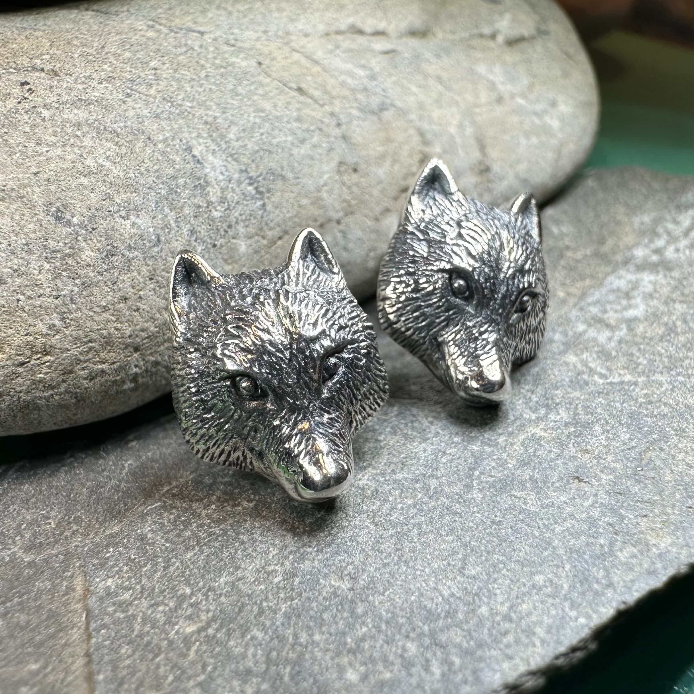 Forest Song Wolf Post Earrings by Celtic Crystal Design Jewelry featuring intricate wolf designs on elegant silver posts.