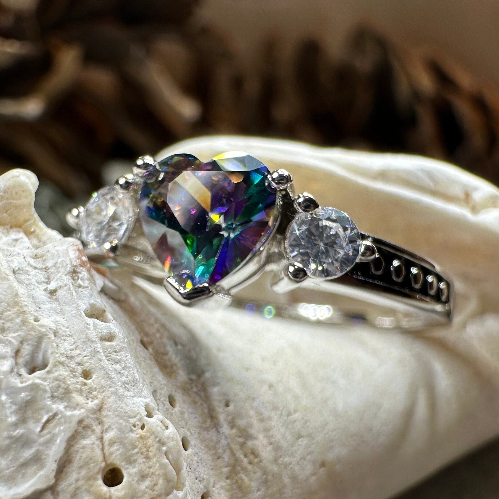 Celtic Crystal Design Jewelry Mystic Topaz Heart Ring featuring a heart-shaped topaz gemstone and intricate Celtic-inspired band.