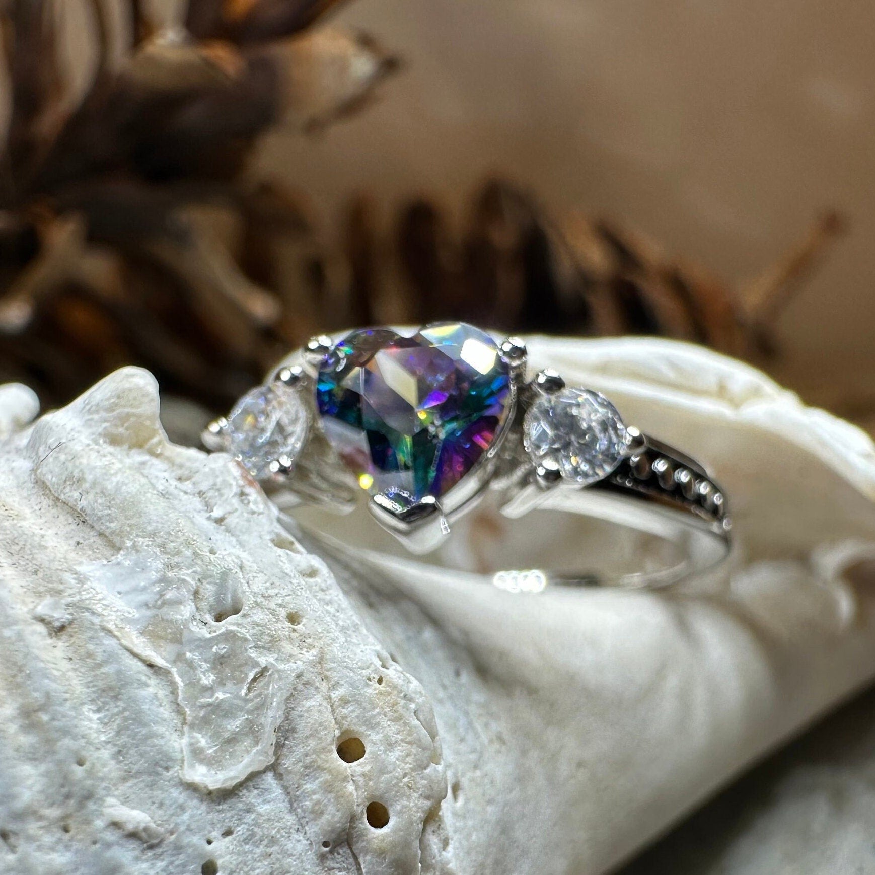 Celtic Crystal Design Jewelry Mystic Topaz Heart Ring featuring a sparkling topaz gemstone on an intricate Celtic band