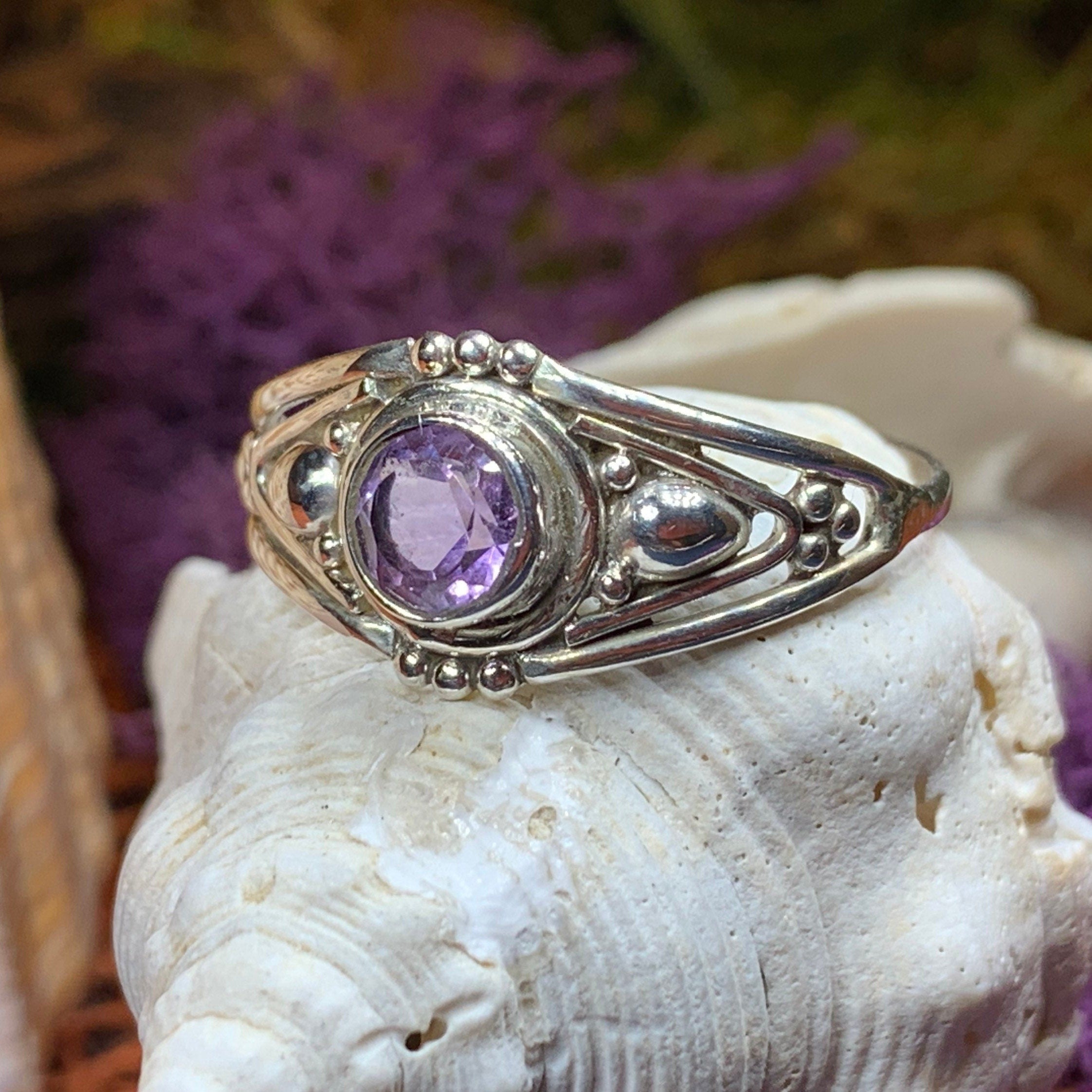Klarina Celtic Ring by Celtic Crystal Design Jewelry featuring an intricate Celtic pattern and a central amethyst gemstone.