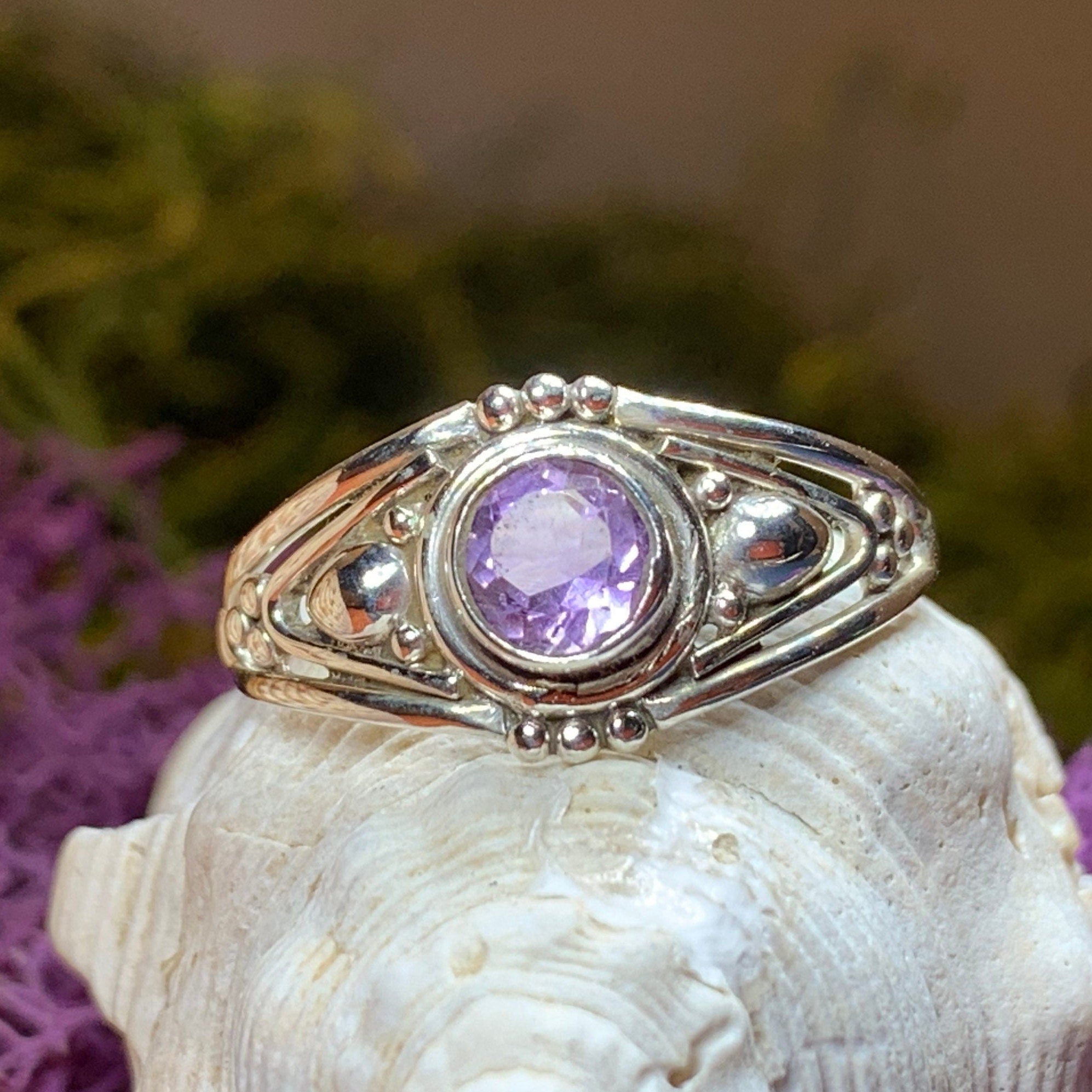 Klarina Celtic Ring by Celtic Crystal Design Jewelry featuring a 7mm amethyst gemstone and intricate Celtic knot details.