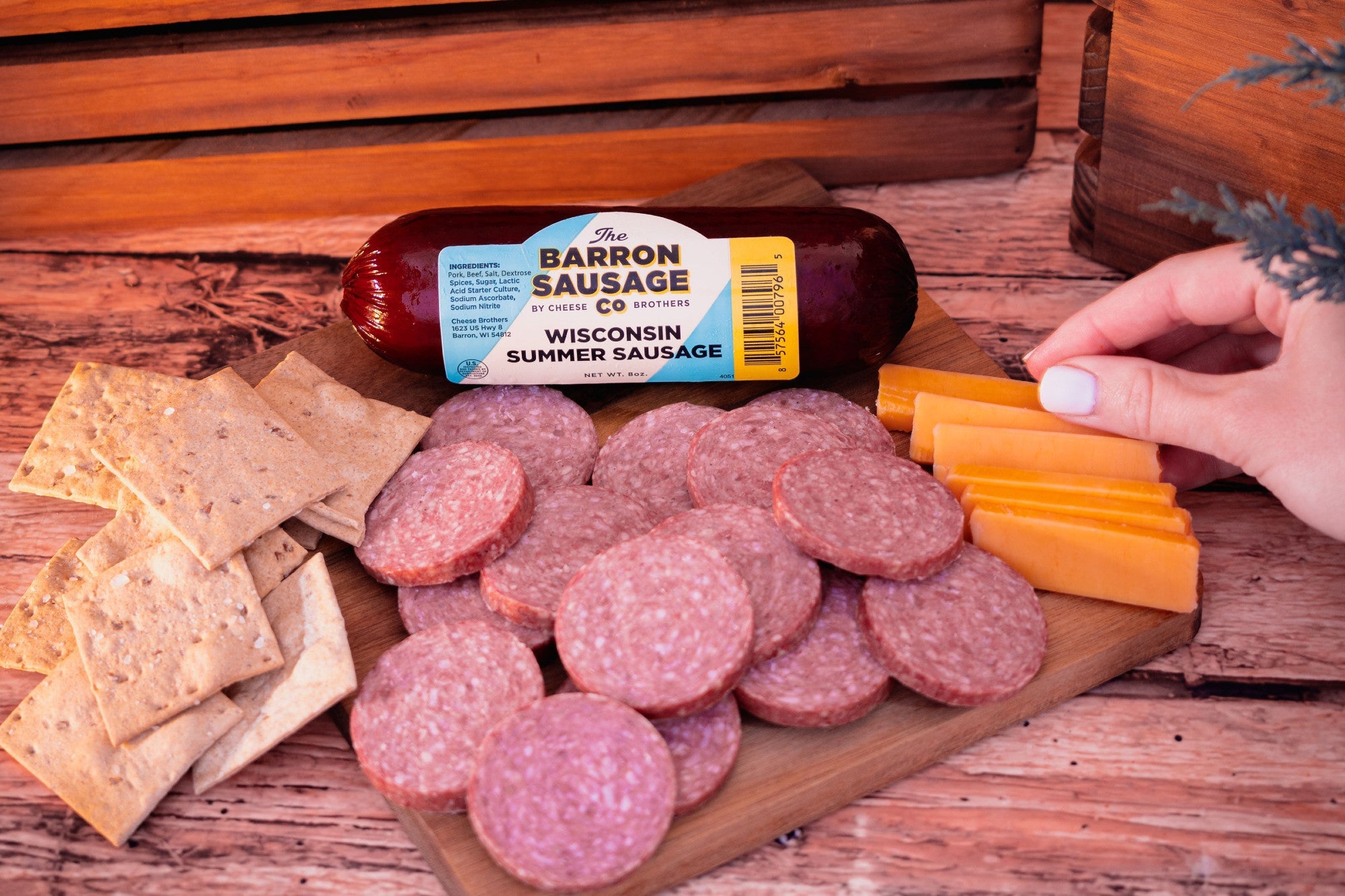 Sliced Barron Sausage Co. Summer Sausage from Cheese Brothers Inc., showing its cured, seasoned meat with a rich, savory appearance.