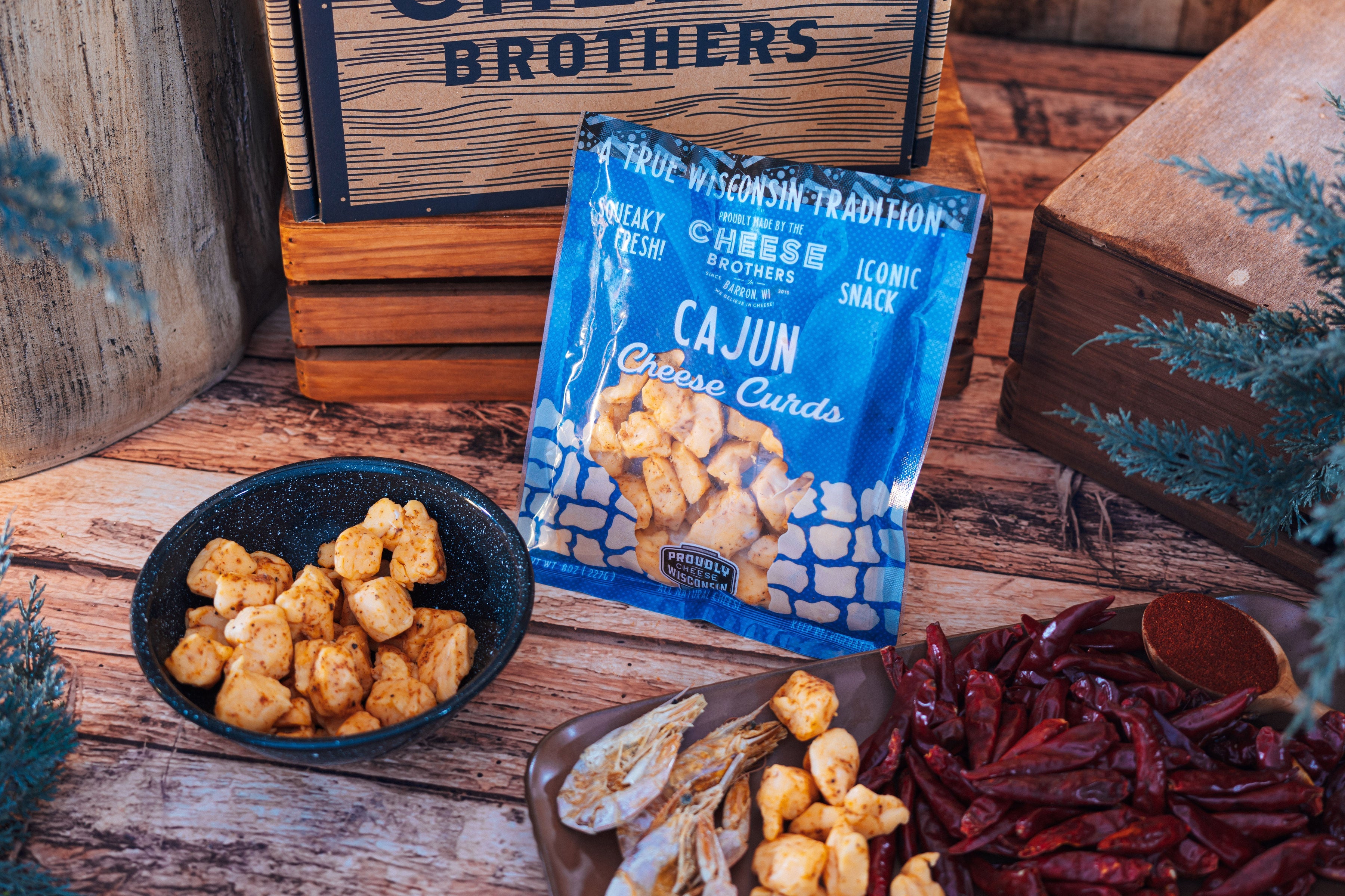 Deluxe Char-CURD-erie gift box from Cheese Brothers, Inc. featuring assorted cheeses and accompaniments in a stylish gift bundle.