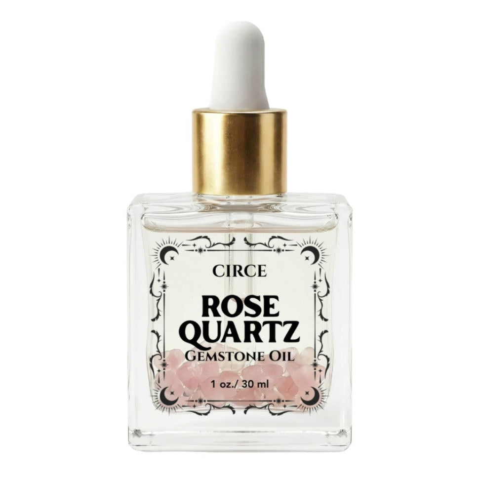 Rose quartz gemstone body oil by Circe Boutique in a 3.4 oz bottle, designed for self-love and glowing skin.