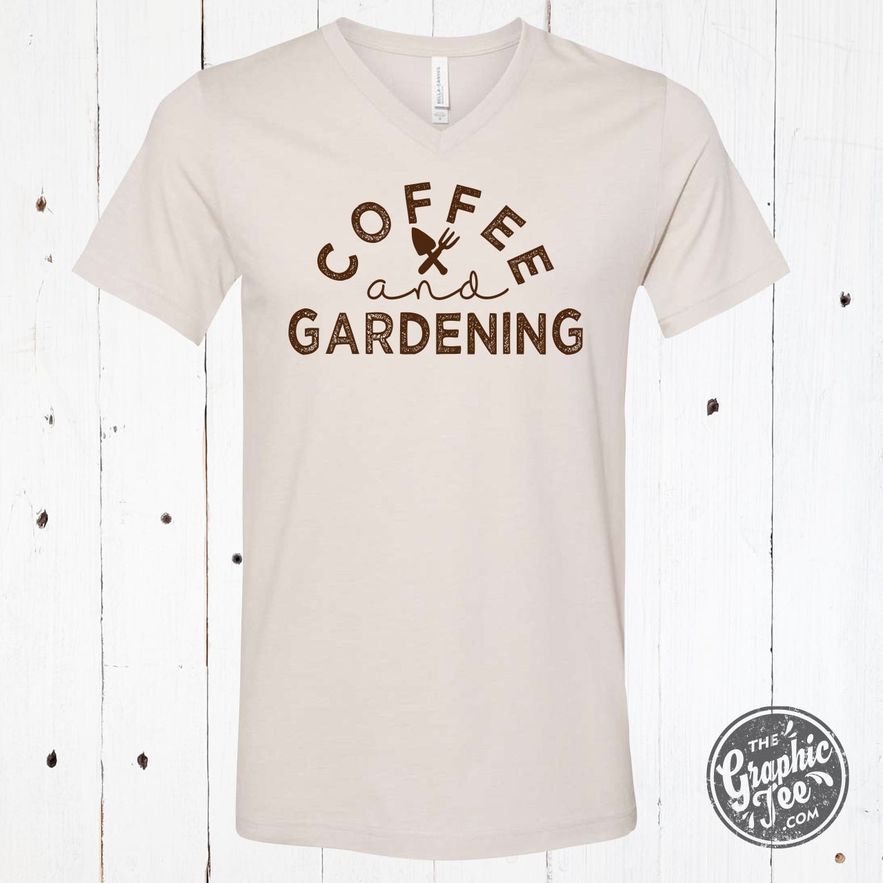 Graphic tee by The Graphic Tee featuring coffee and gardening motifs on a short sleeve V-neck design.