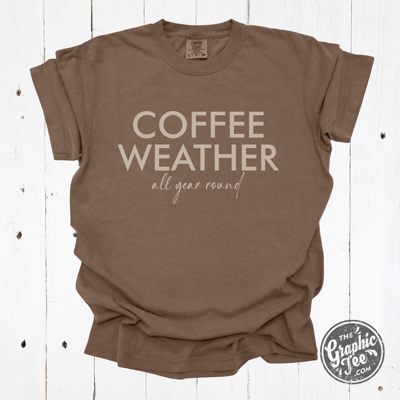 Coffee Weather All Year Round pigment dyed SS graphic tee by The Graphic Tee, featuring a casual, vintage-inspired design.
