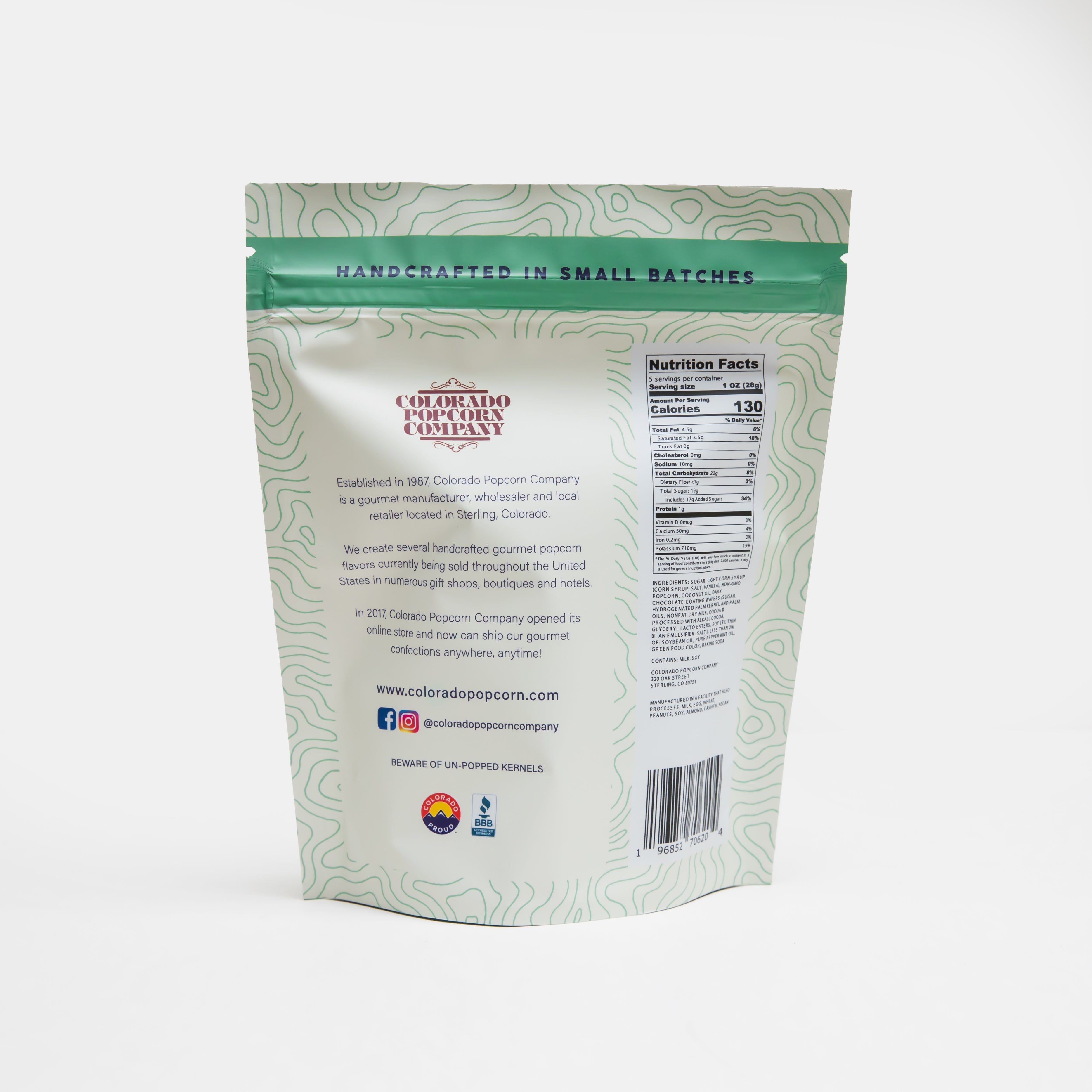 Chocolate mint popcorn from Colorado Popcorn Company in a 5 oz bag, showing glossy coated popcorn with mint chocolate flavor.